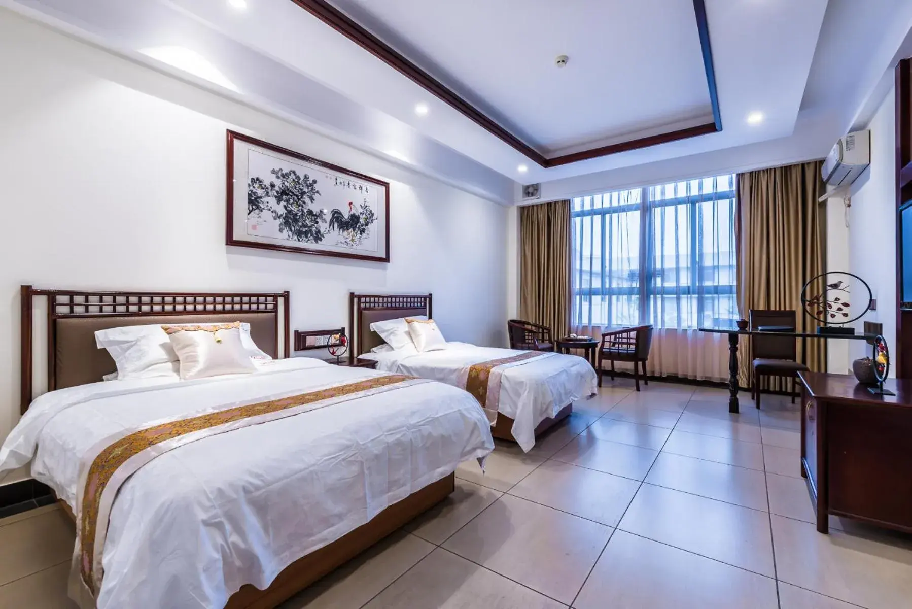 Deluxe Twin Room - single occupancy in Hainan Jingshan Hotel Deluxe Twin Room - single occupancy in Hainan Jingshan Hotel