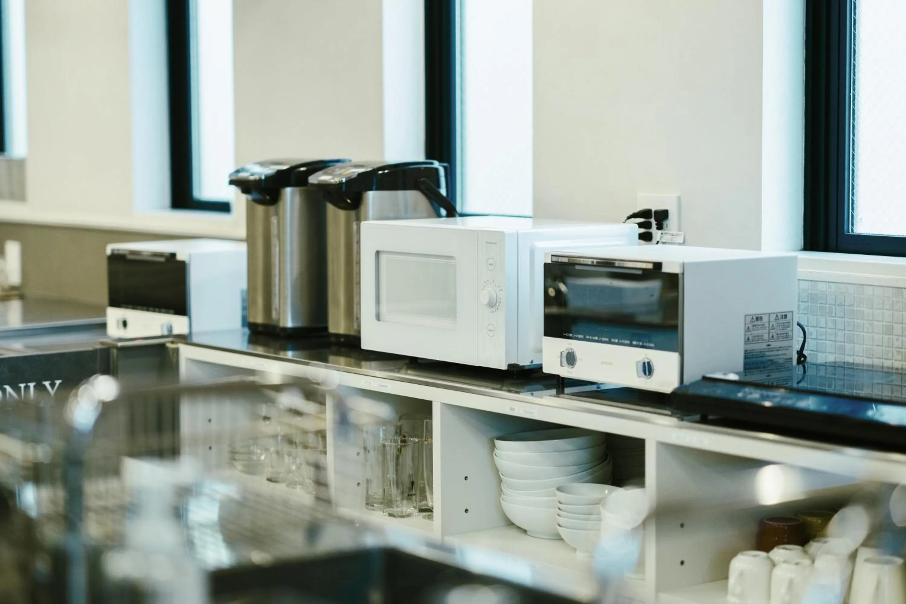 Communal kitchen in WeBase Hakata Hostel