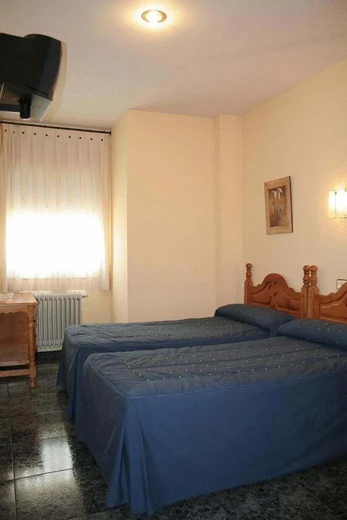 Photo of the whole room, Bed in Parque