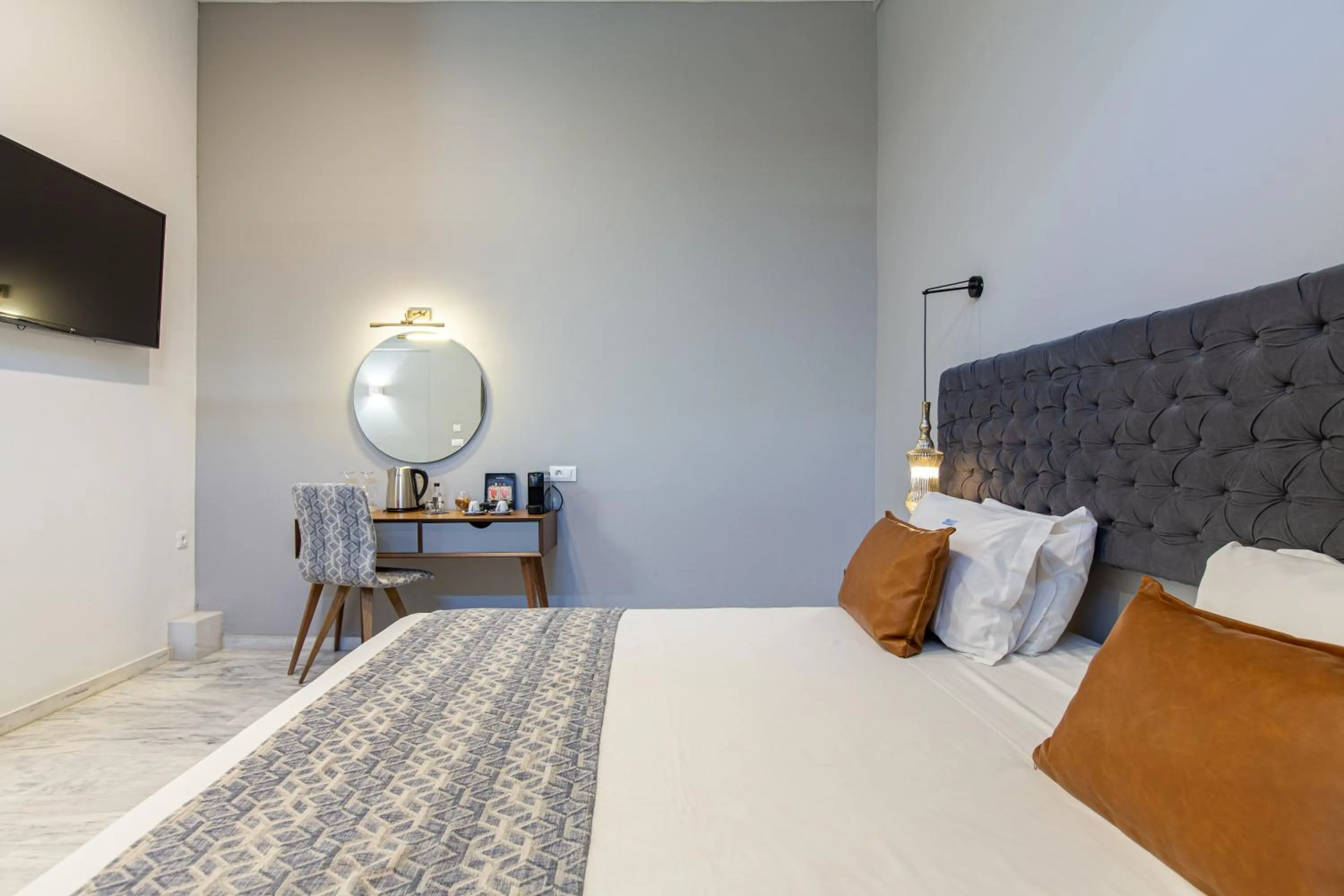 Bed in Minaret Suites and Apartments