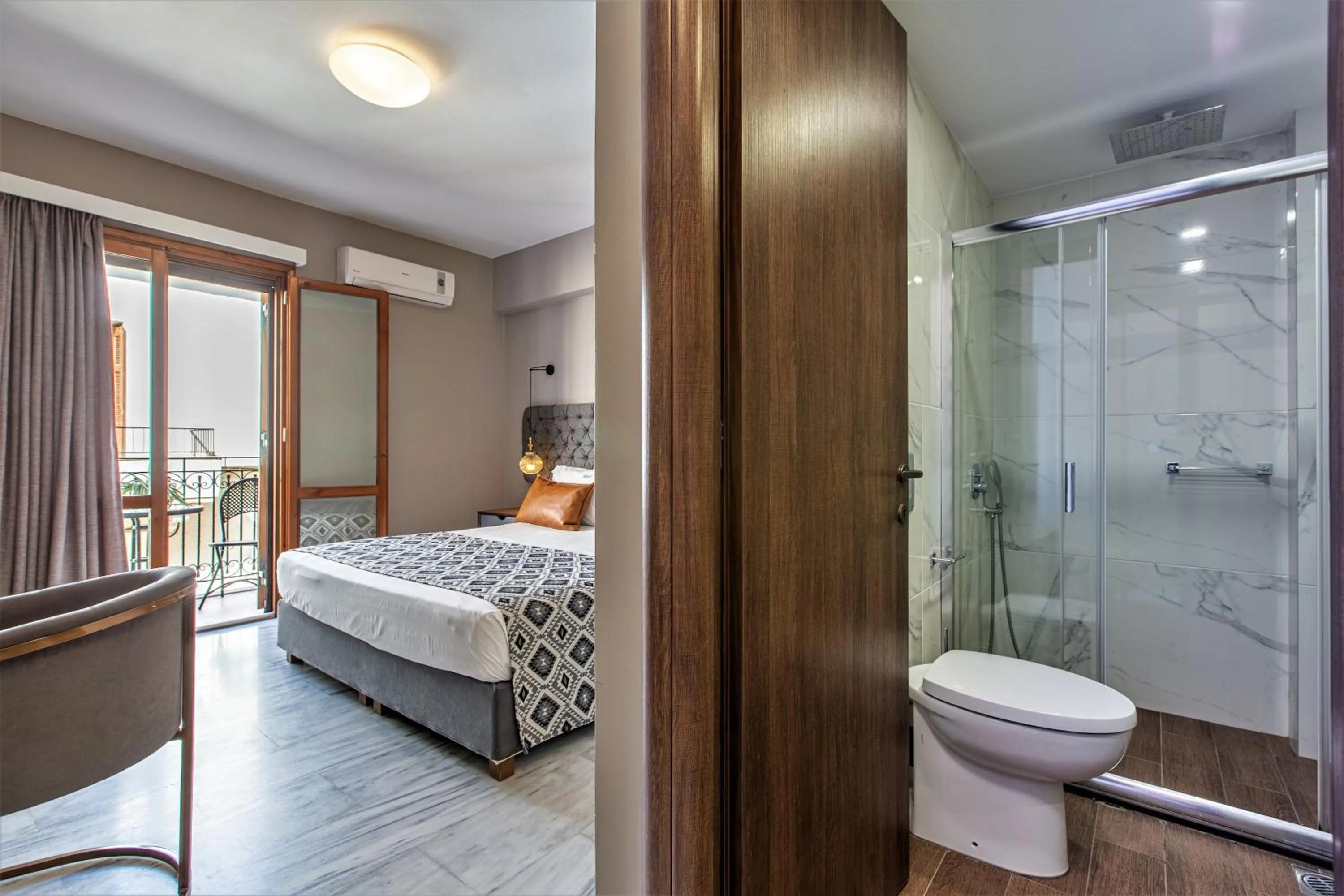 Bed in Minaret Suites and Apartments