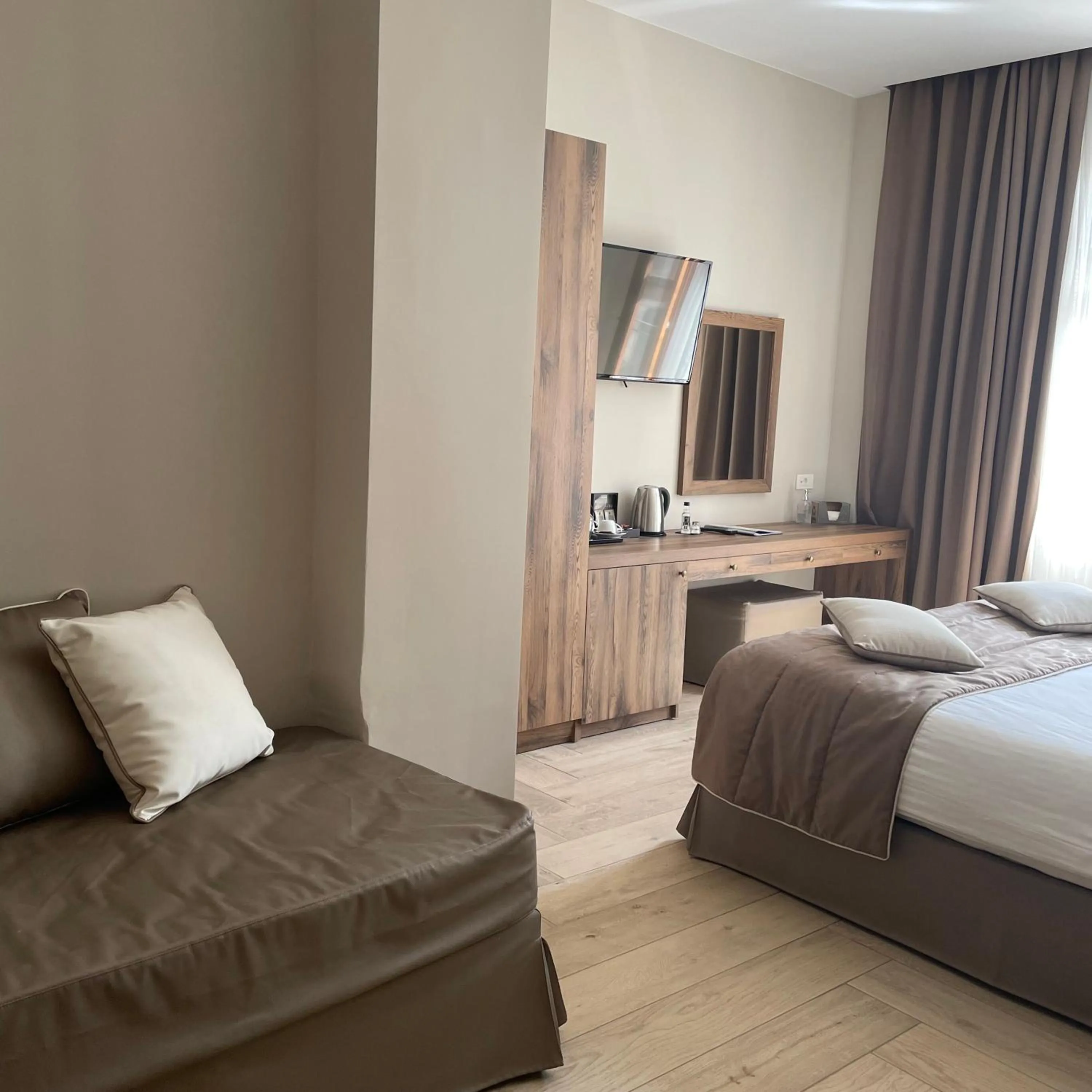 Bed in Minaret Suites and Apartments