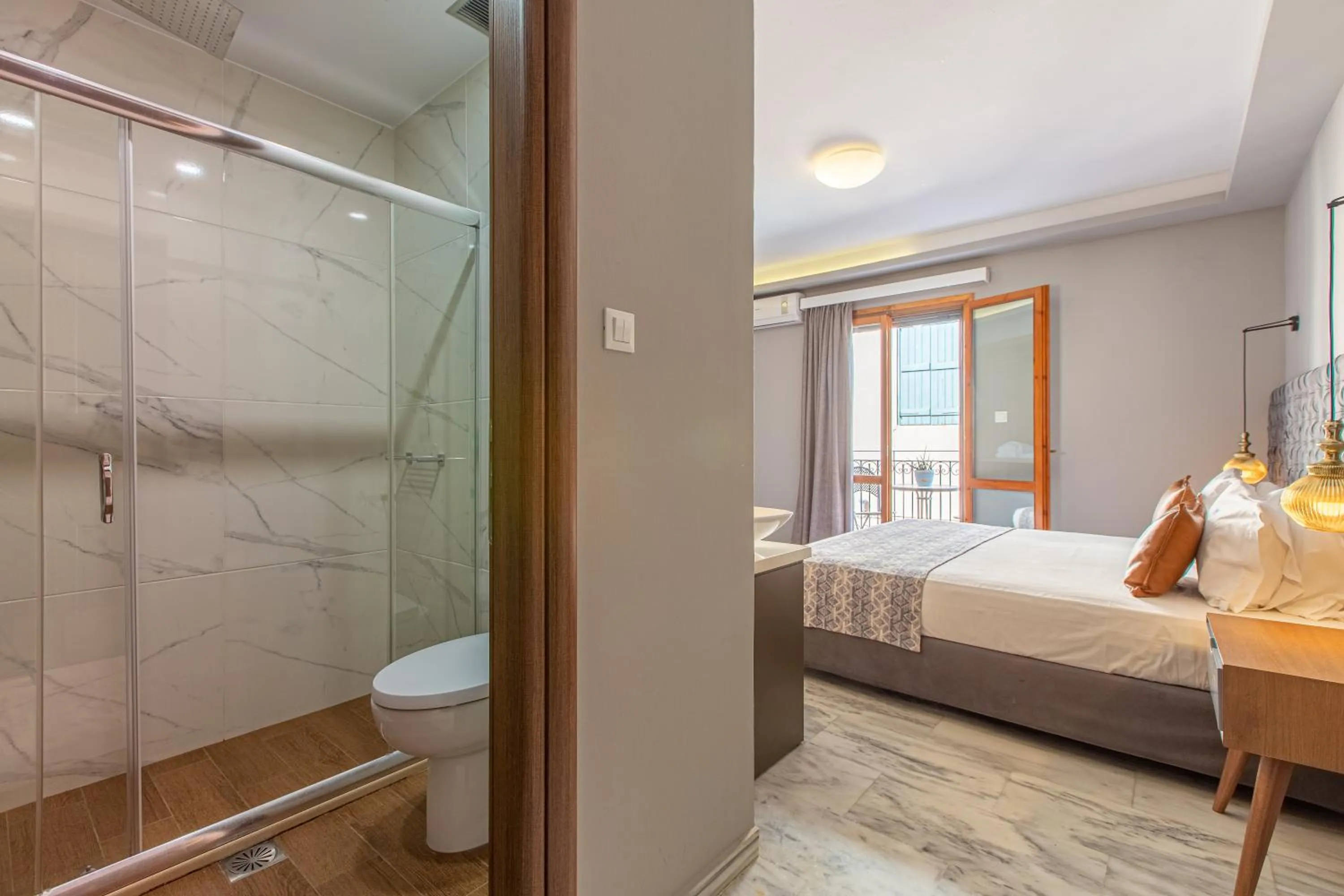 Bed in Minaret Suites and Apartments