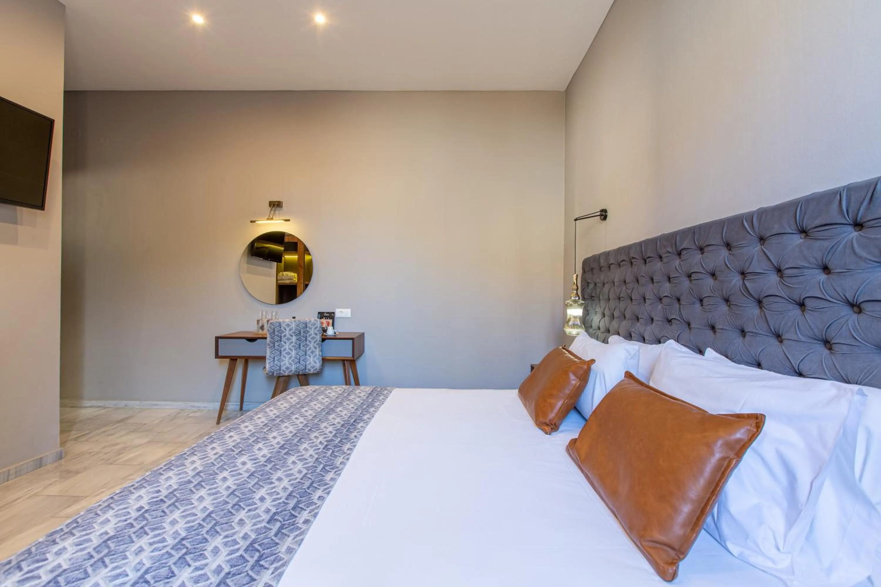 Bed in Minaret Suites and Apartments