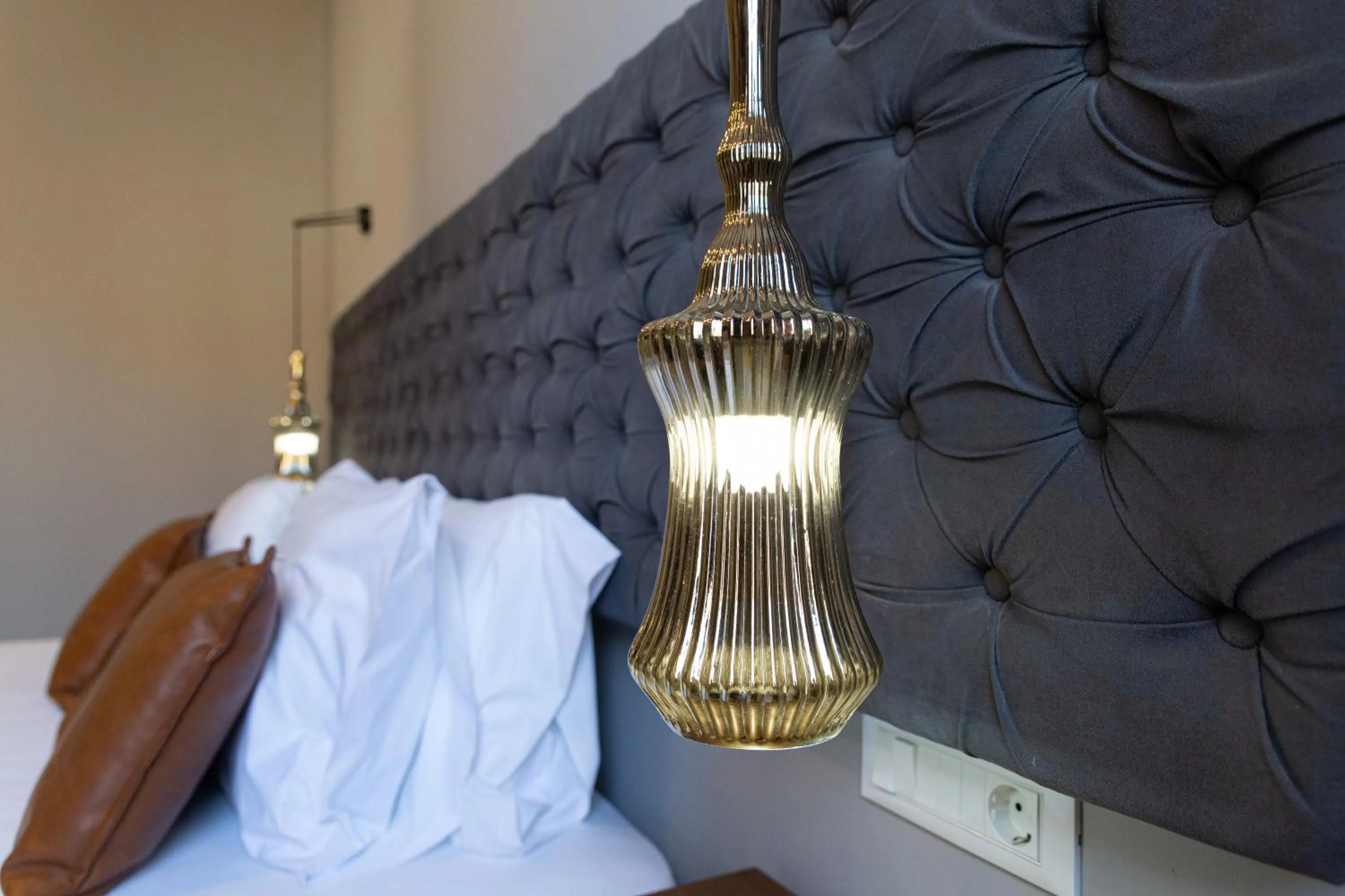 Bed in Minaret Suites and Apartments