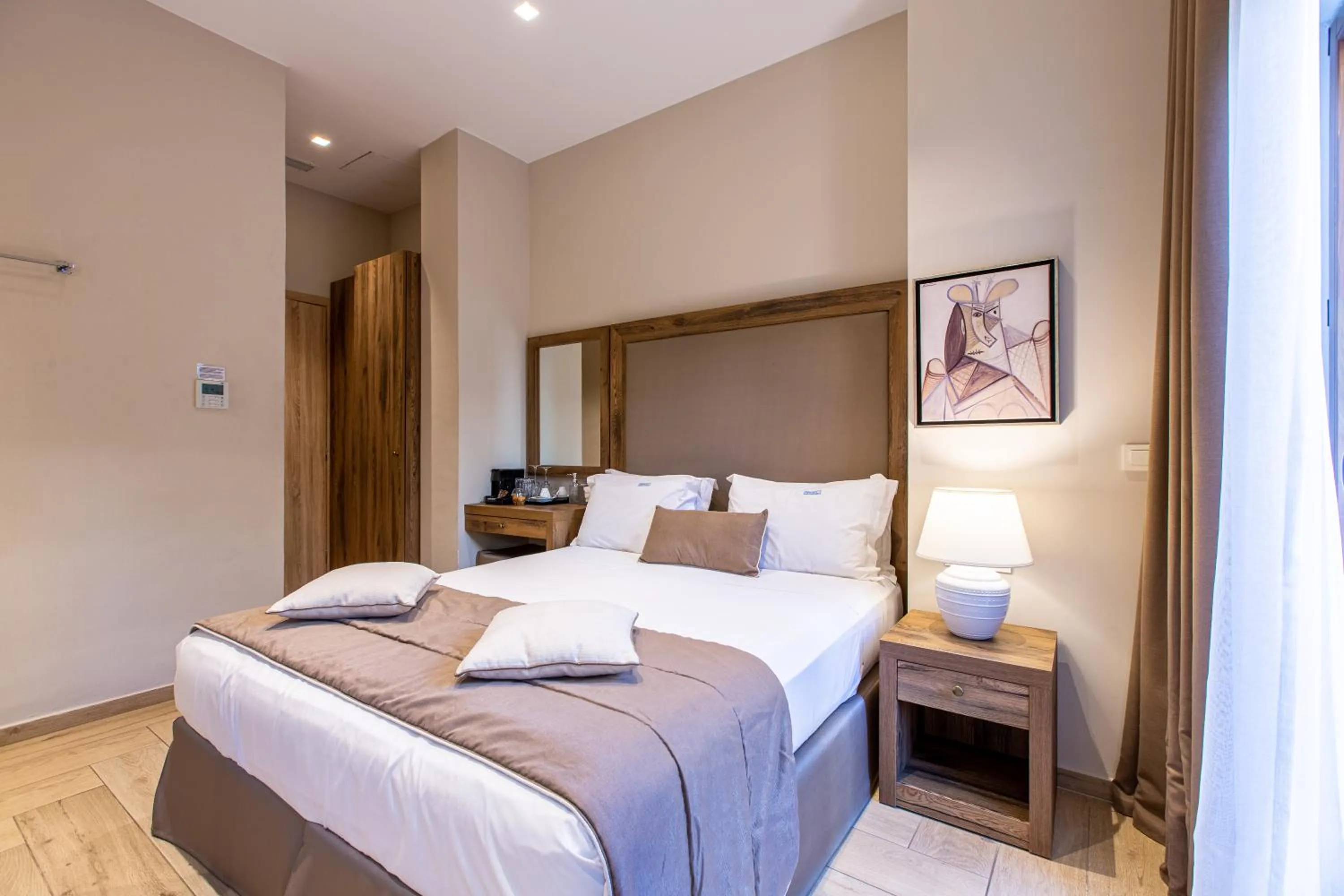 Bed in Minaret Suites and Apartments