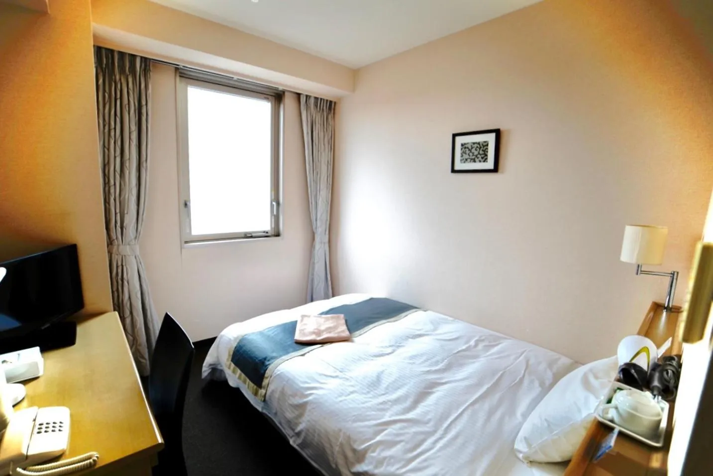 Bed in Hotel Frontier Iwaki