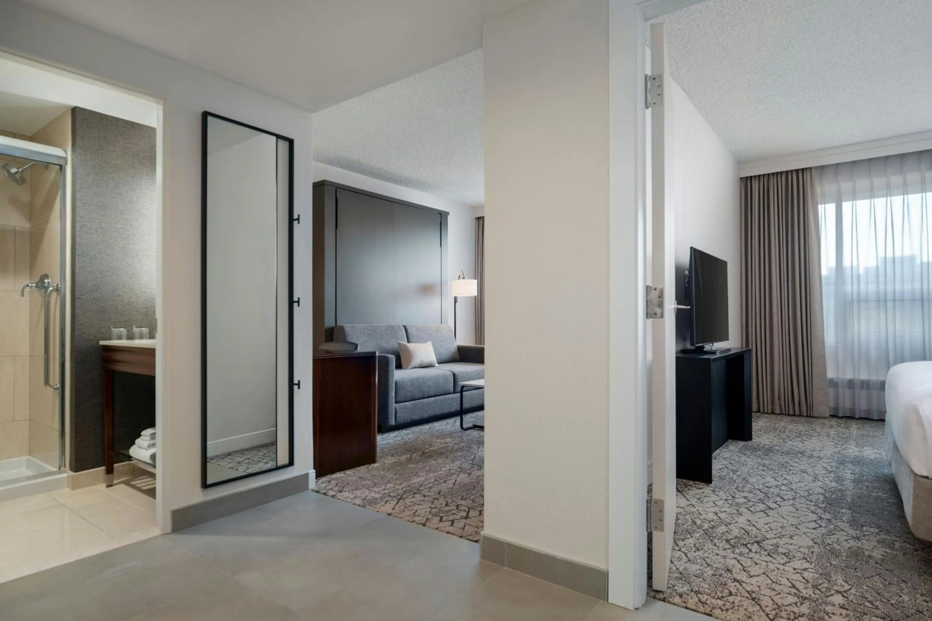 Bathroom, Bed in Sheraton Cavalier Saskatoon Hotel