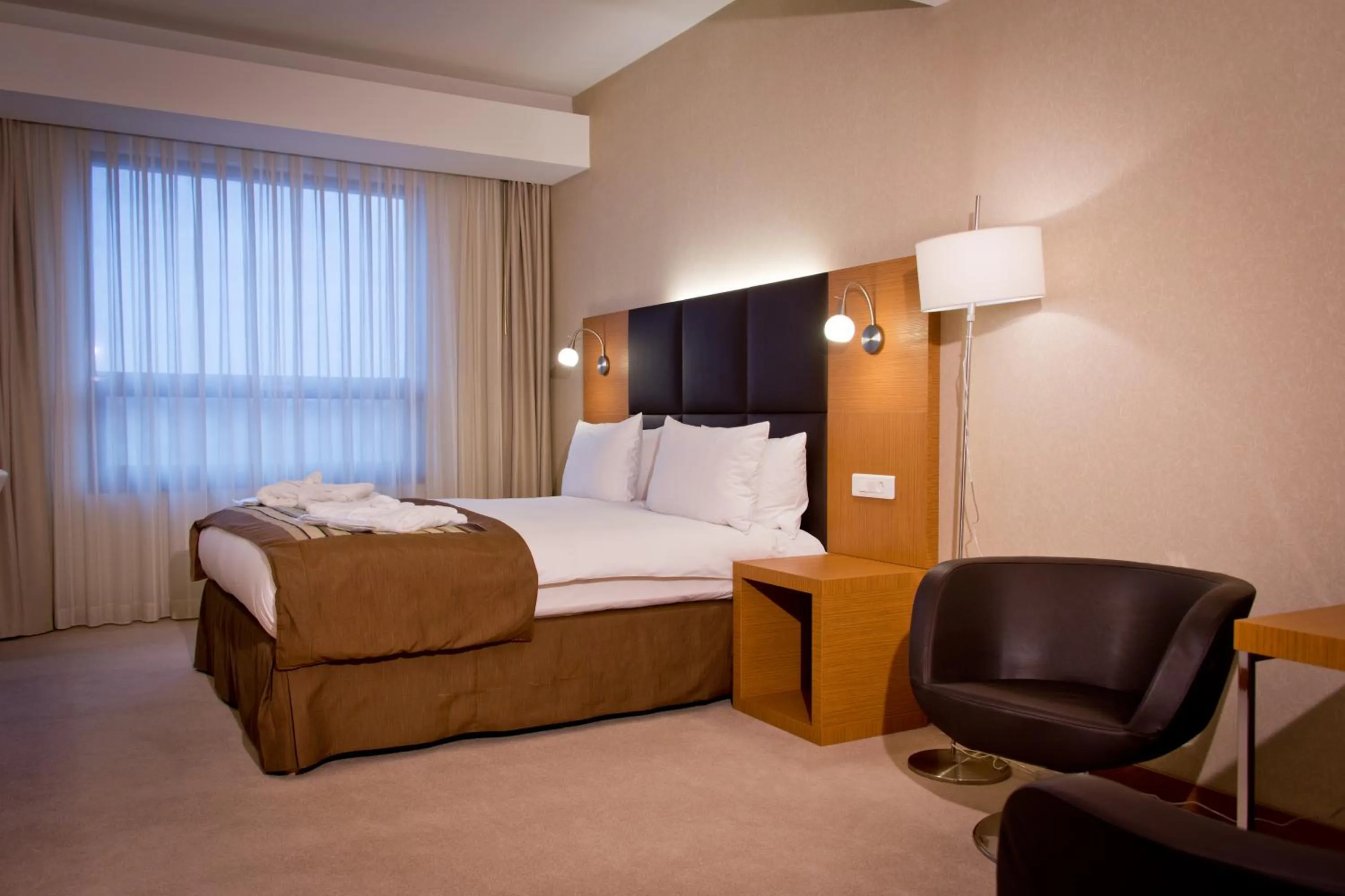 Bed in Ramada by Wyndham Oradea