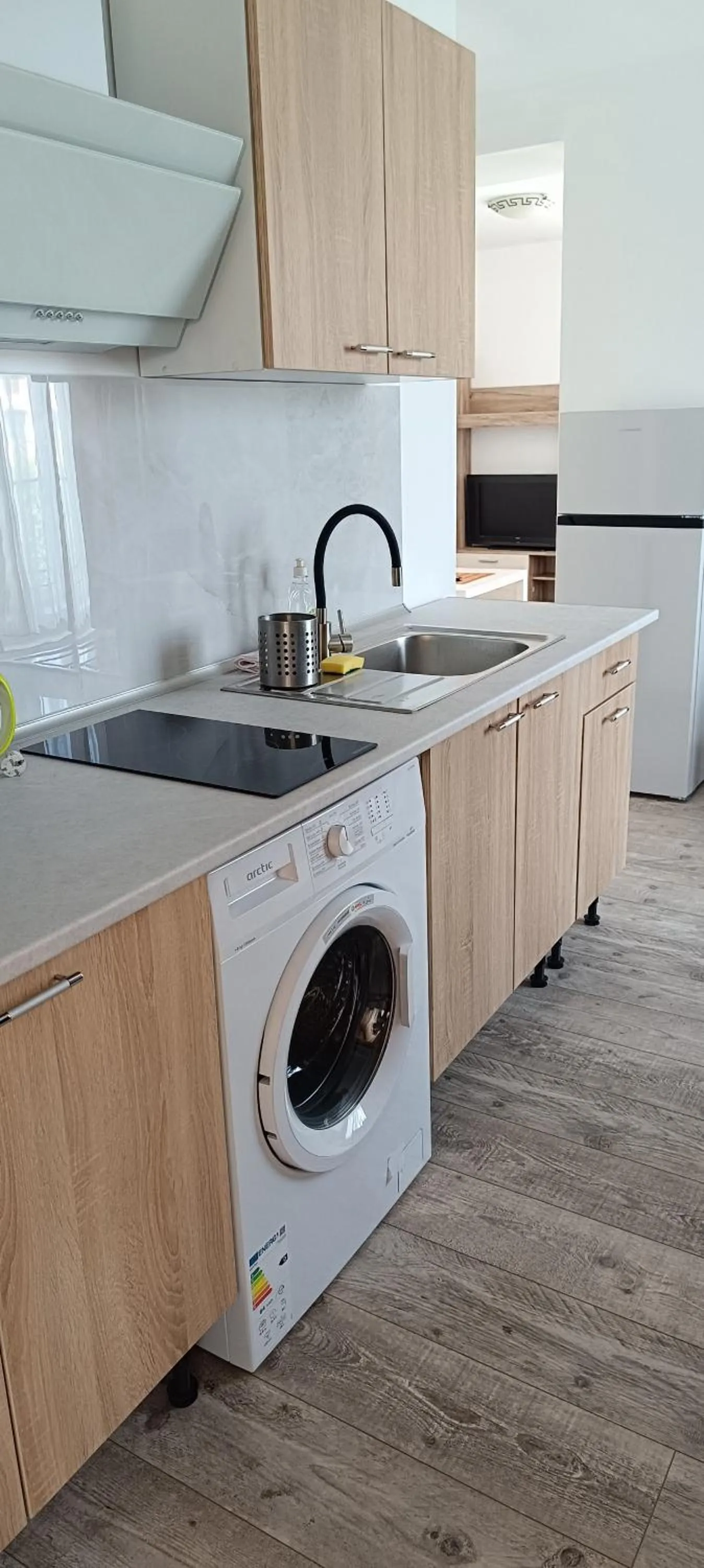 Kitchen or kitchenette in Pensiunea Caramell