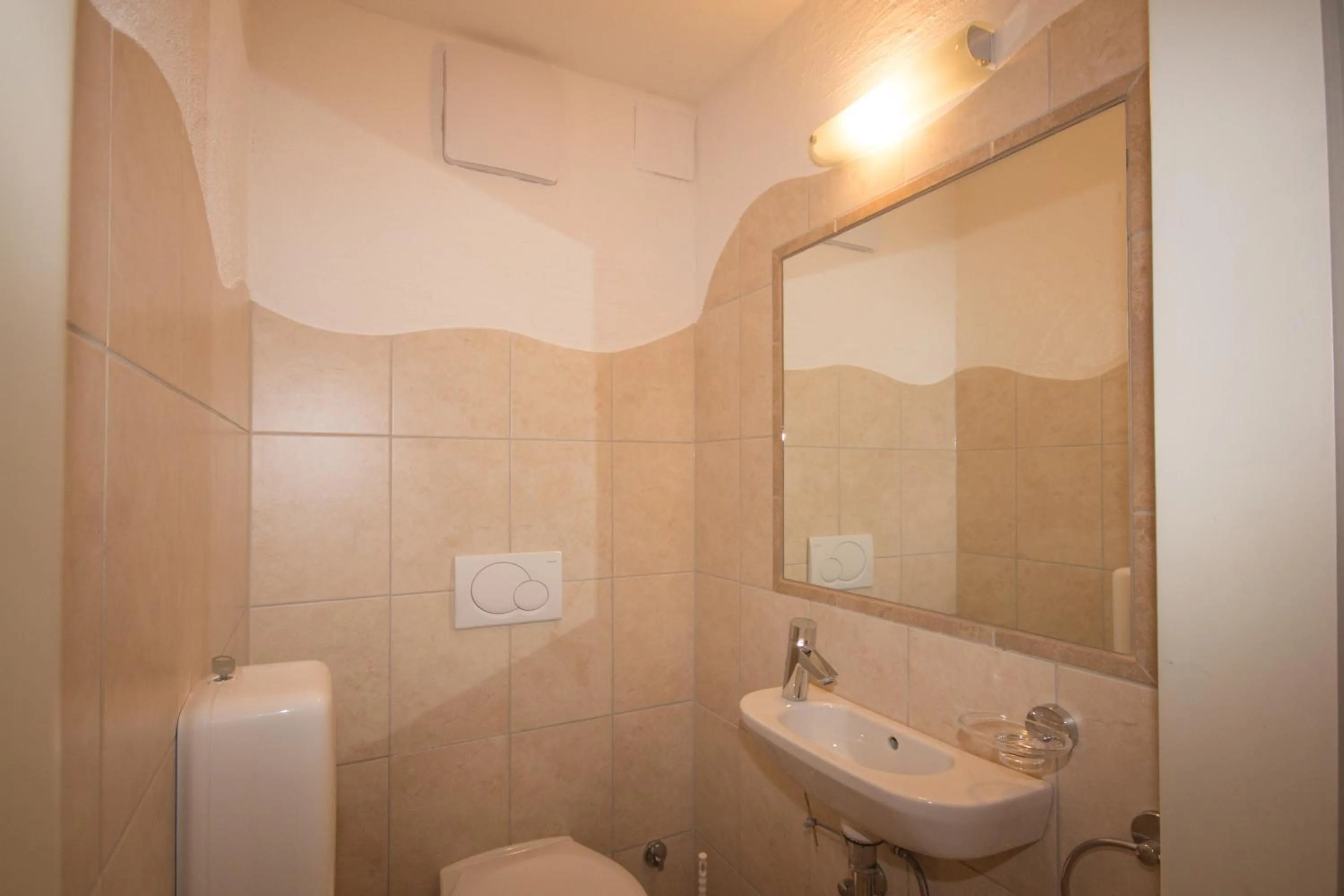 Bathroom in Berggasthof Hochzeigerhaus