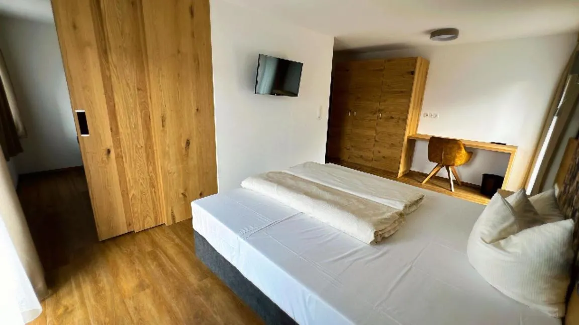 Bedroom, Bed in Berggasthof Hochzeigerhaus