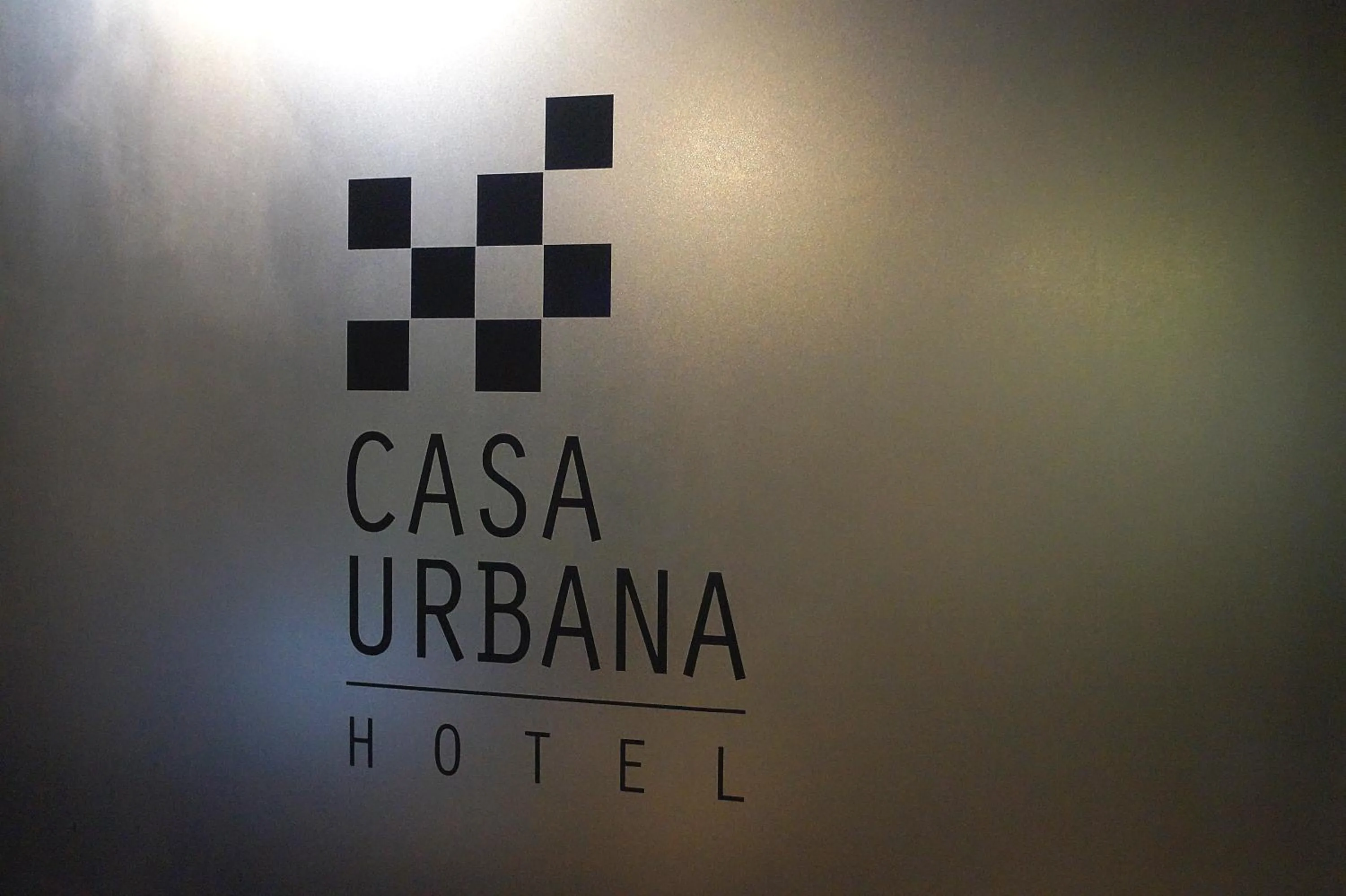Property logo or sign in Casa Urbana Hotel