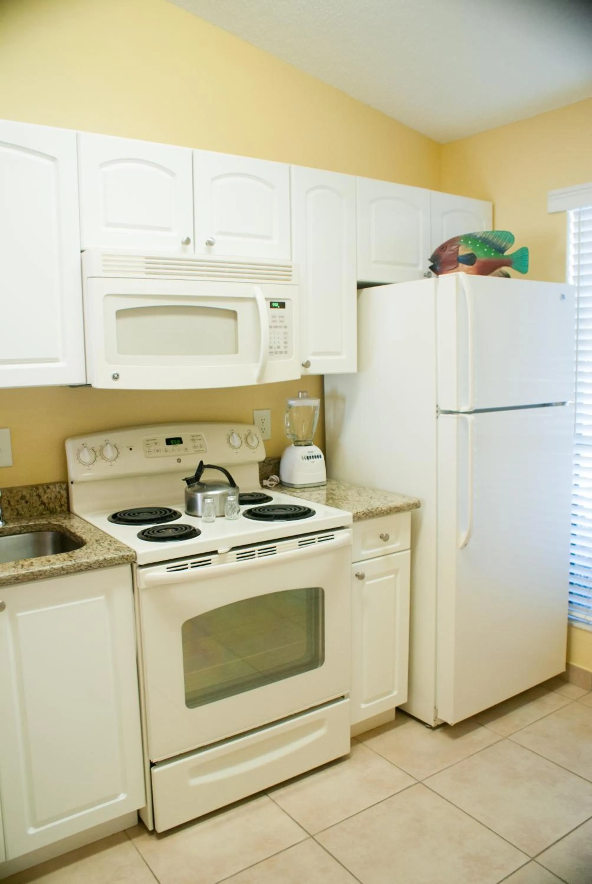 Kitchen or kitchenette in Villas at Fortune Place