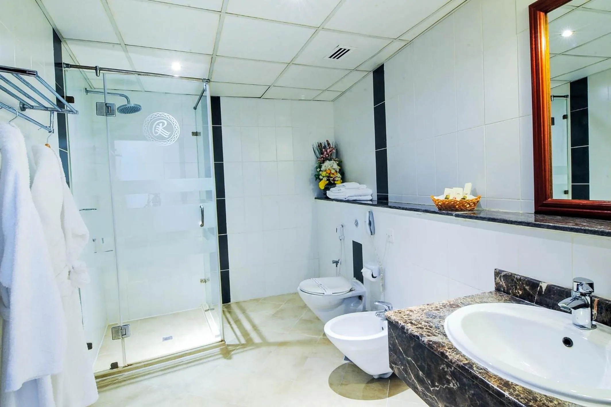 Shower in Ramee California Hotel