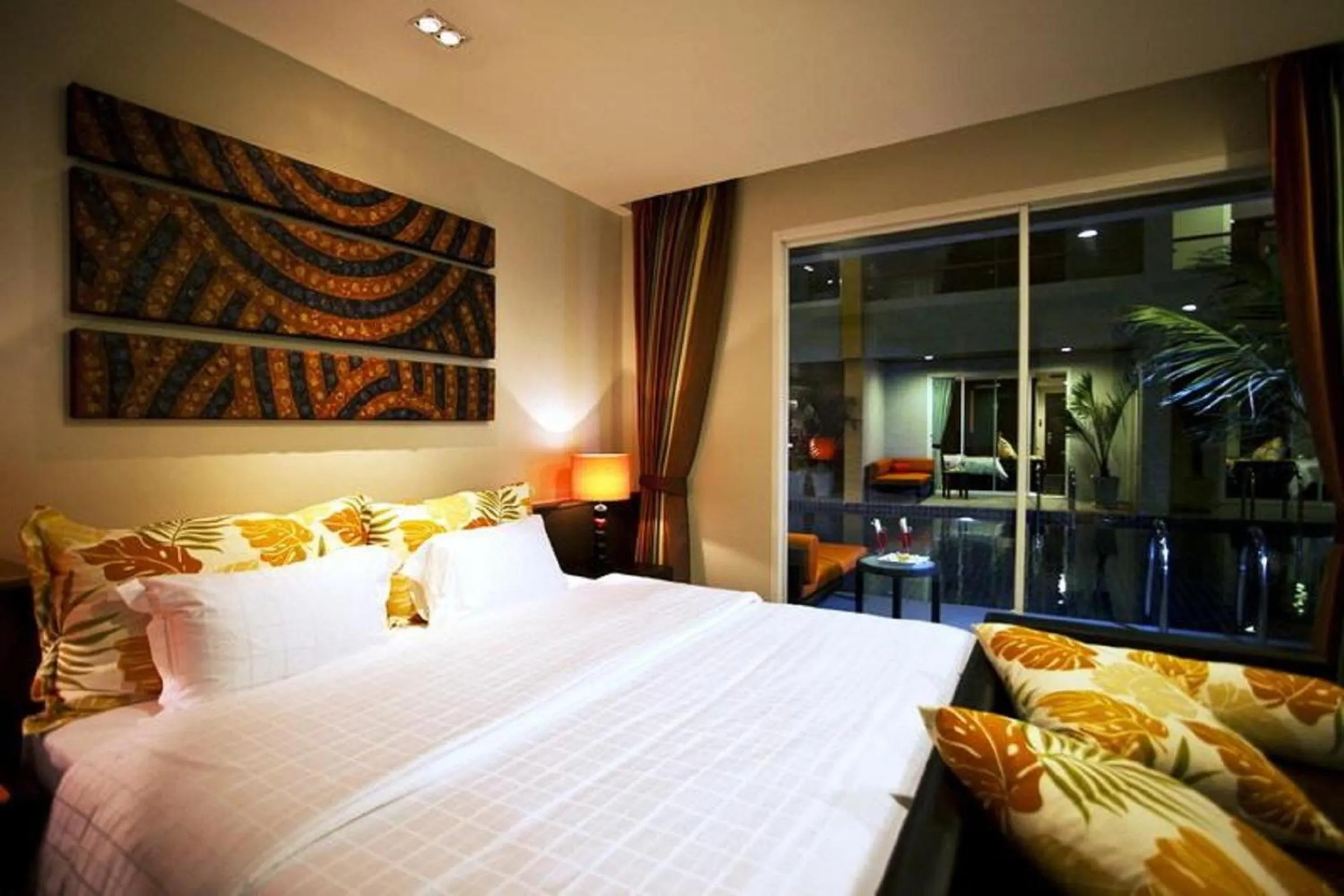 Bed in FuramaXclusive Sandara Hua Hin at Cha-am Beach