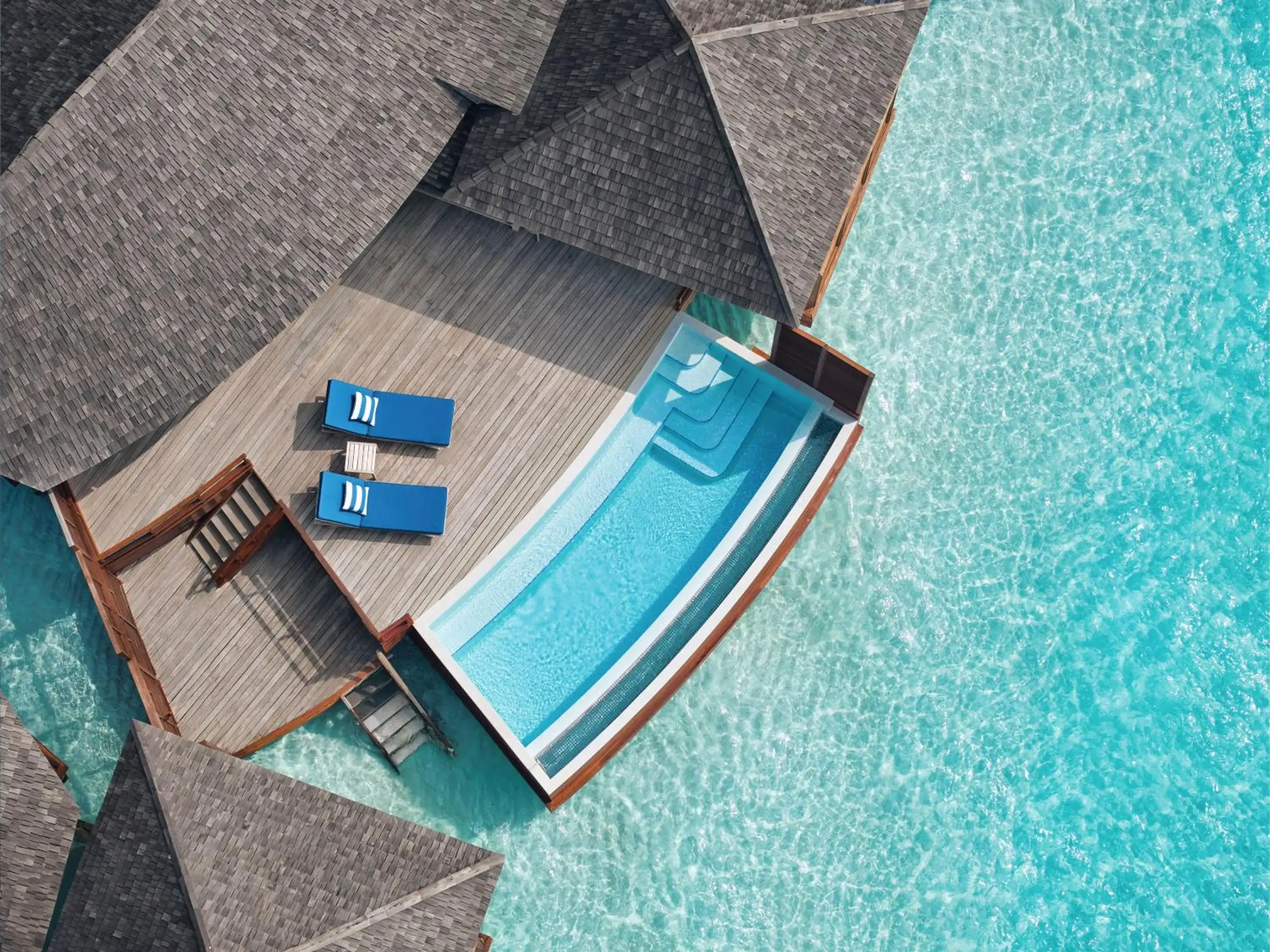 Deluxe Sunset Over Water Pool Villa in Anantara Dhigu Maldives Resort Deluxe Sunset Over Water Pool Villa in Anantara Dhigu Maldives Resort