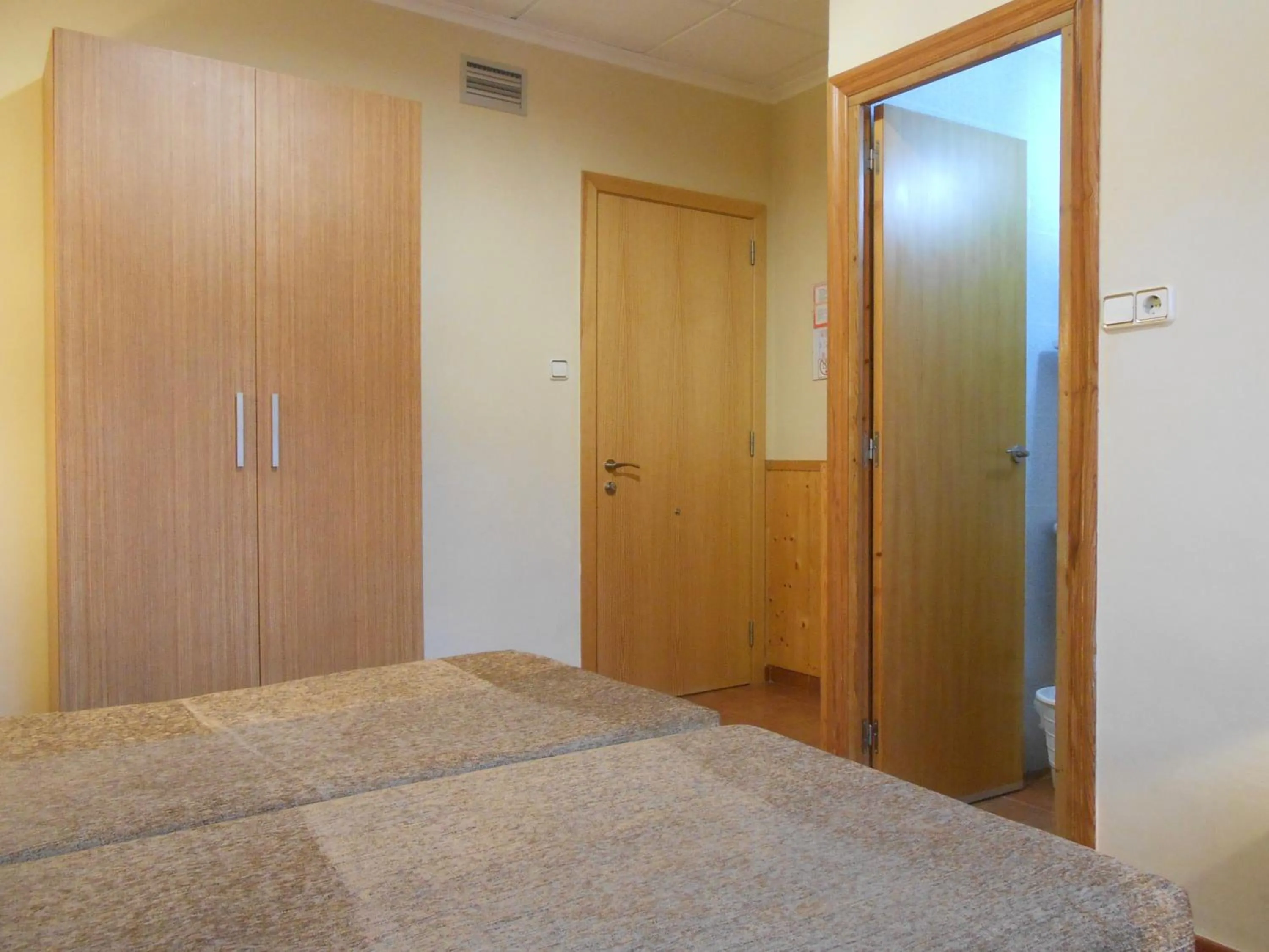 Bed in Hostal El Callejón