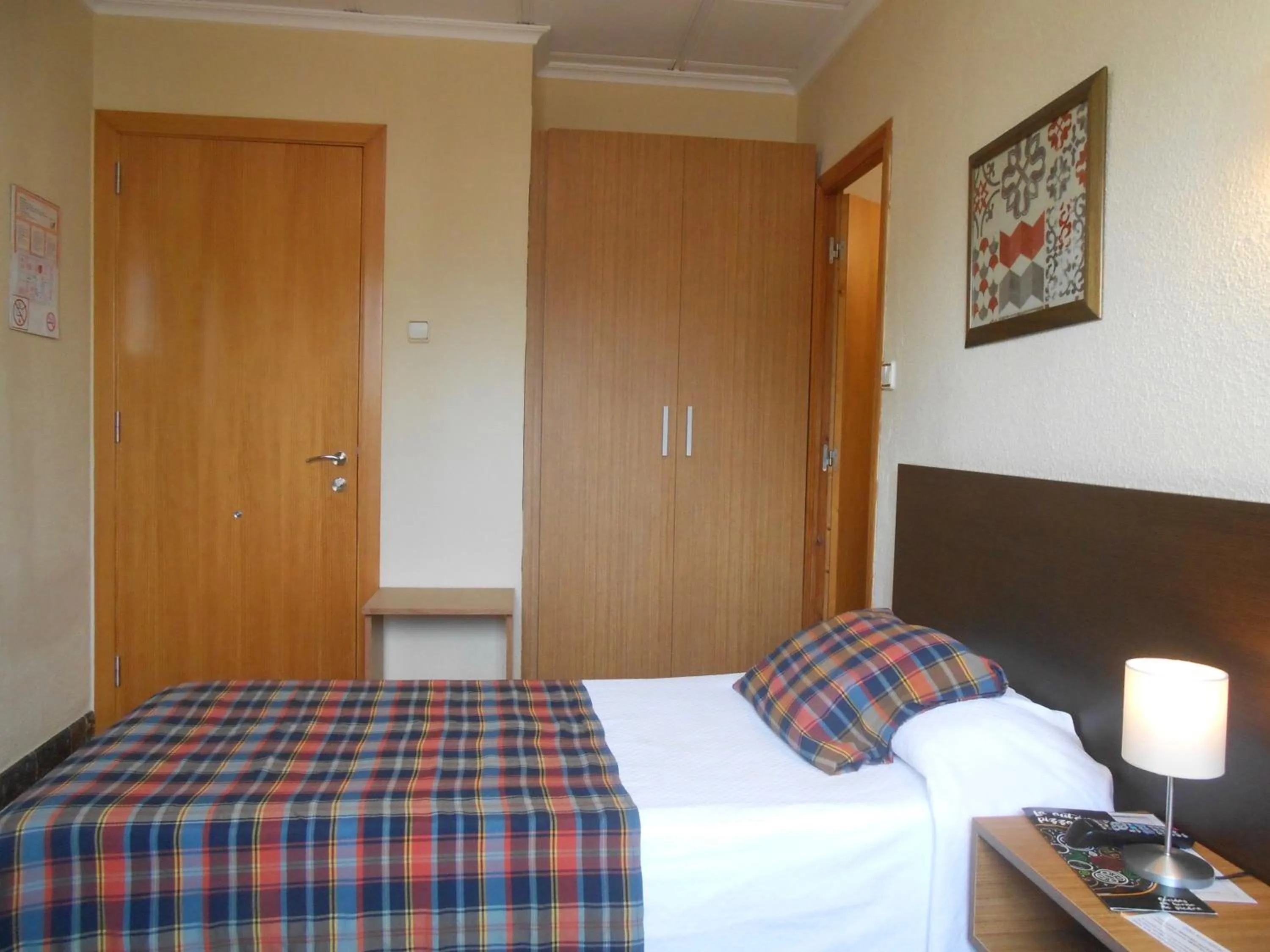 Bed in Hostal El Callejón