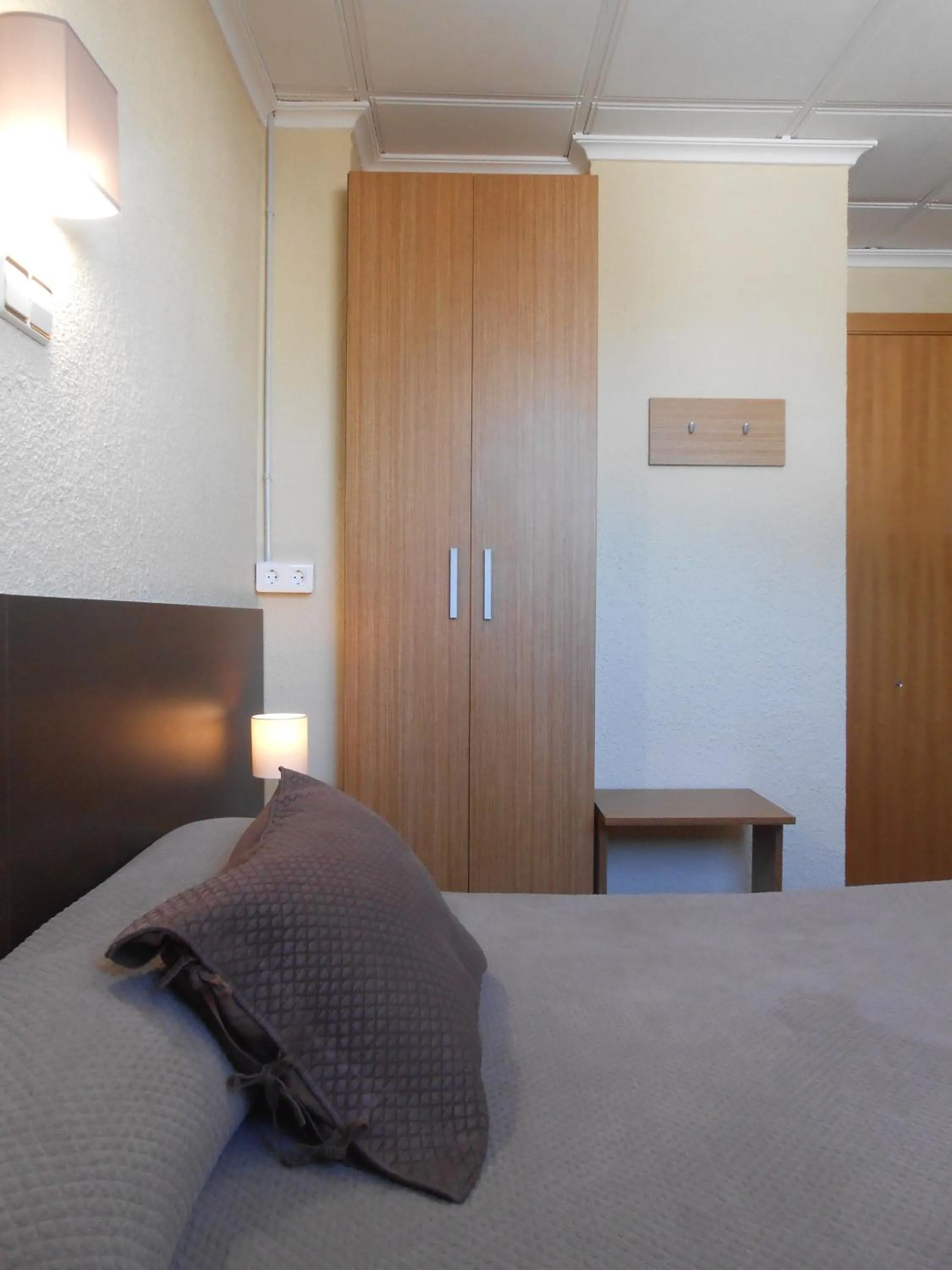 Bed in Hostal El Callejón