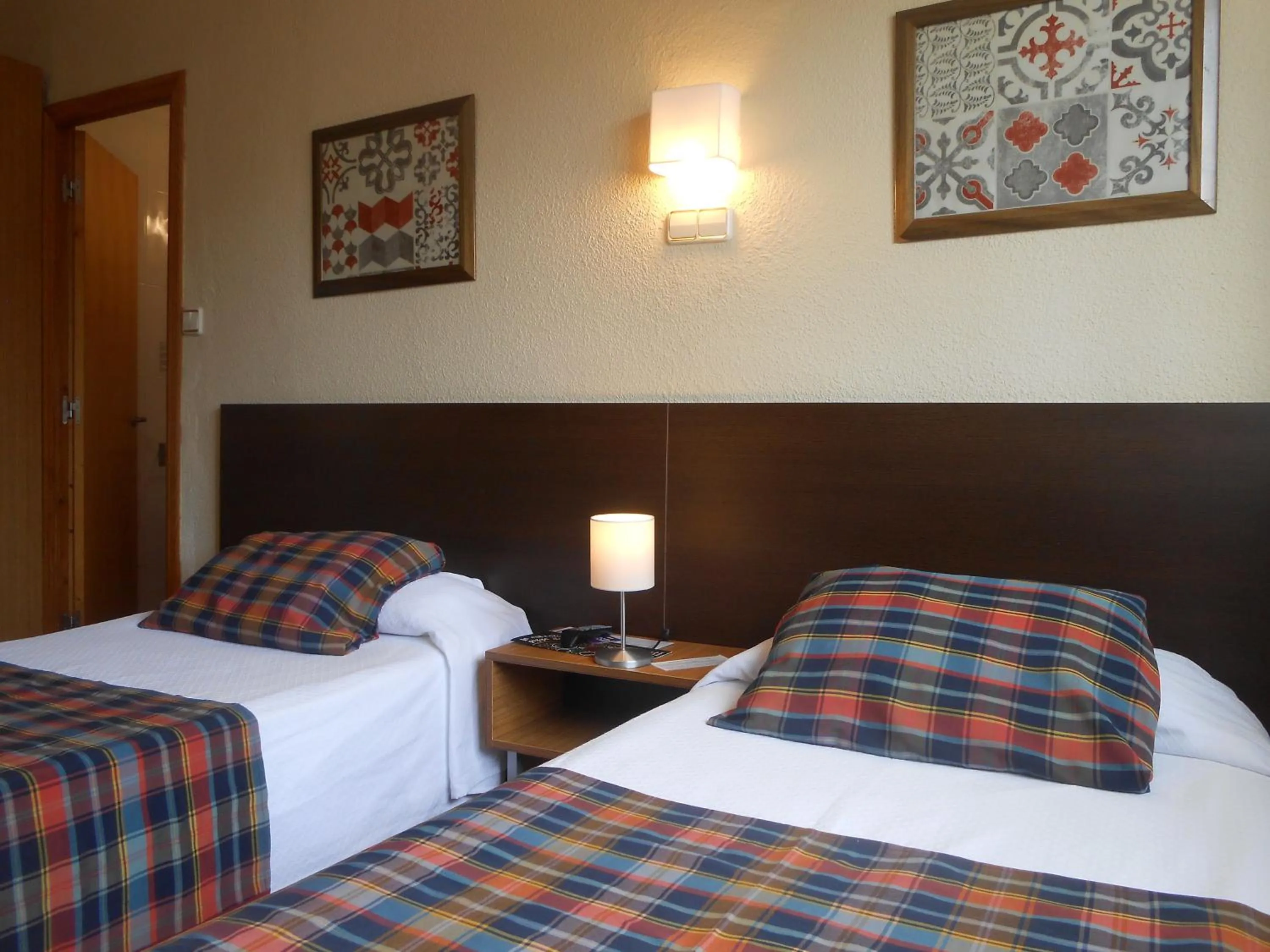 Bed in Hostal El Callejón