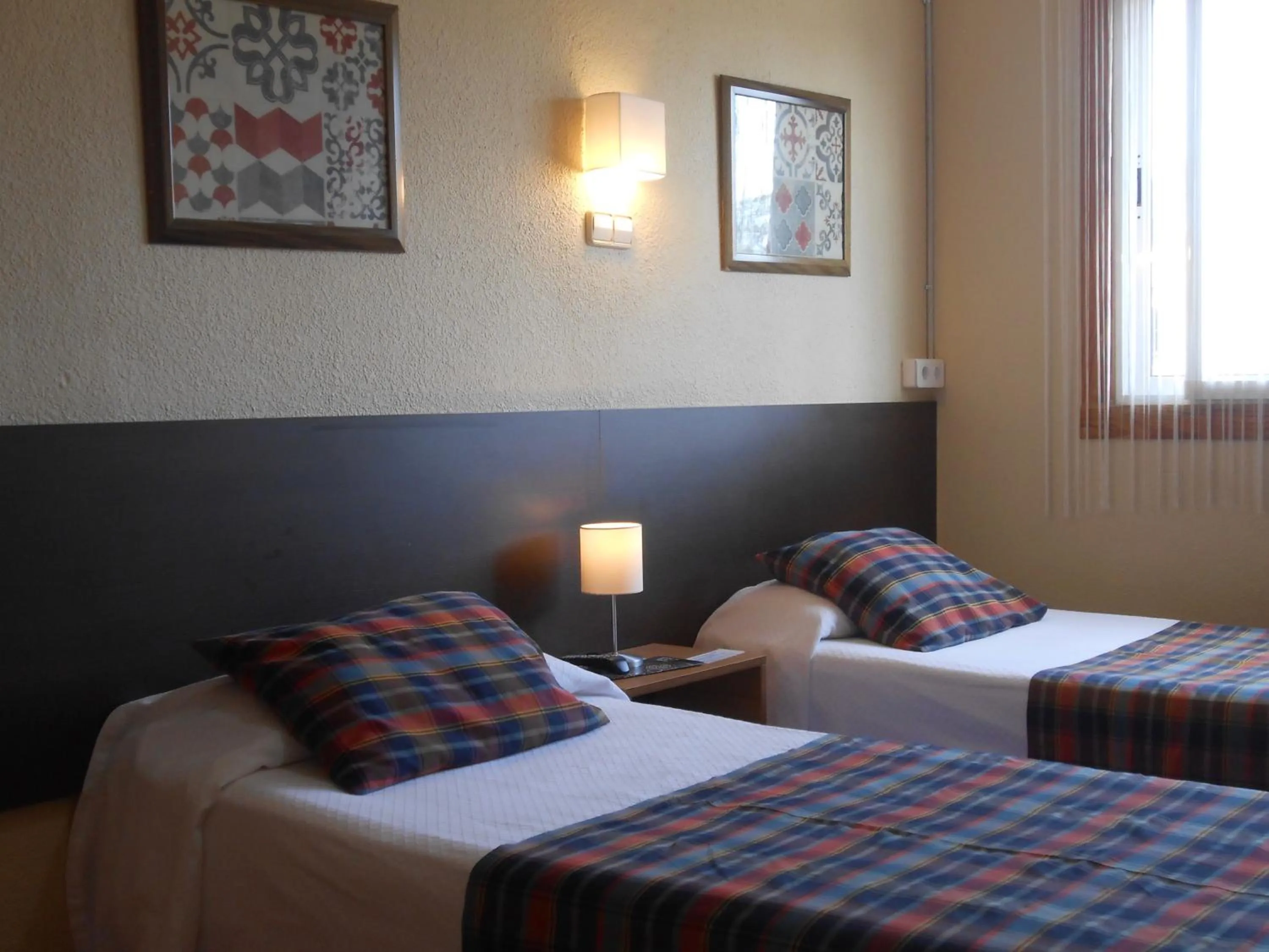 Bed in Hostal El Callejón