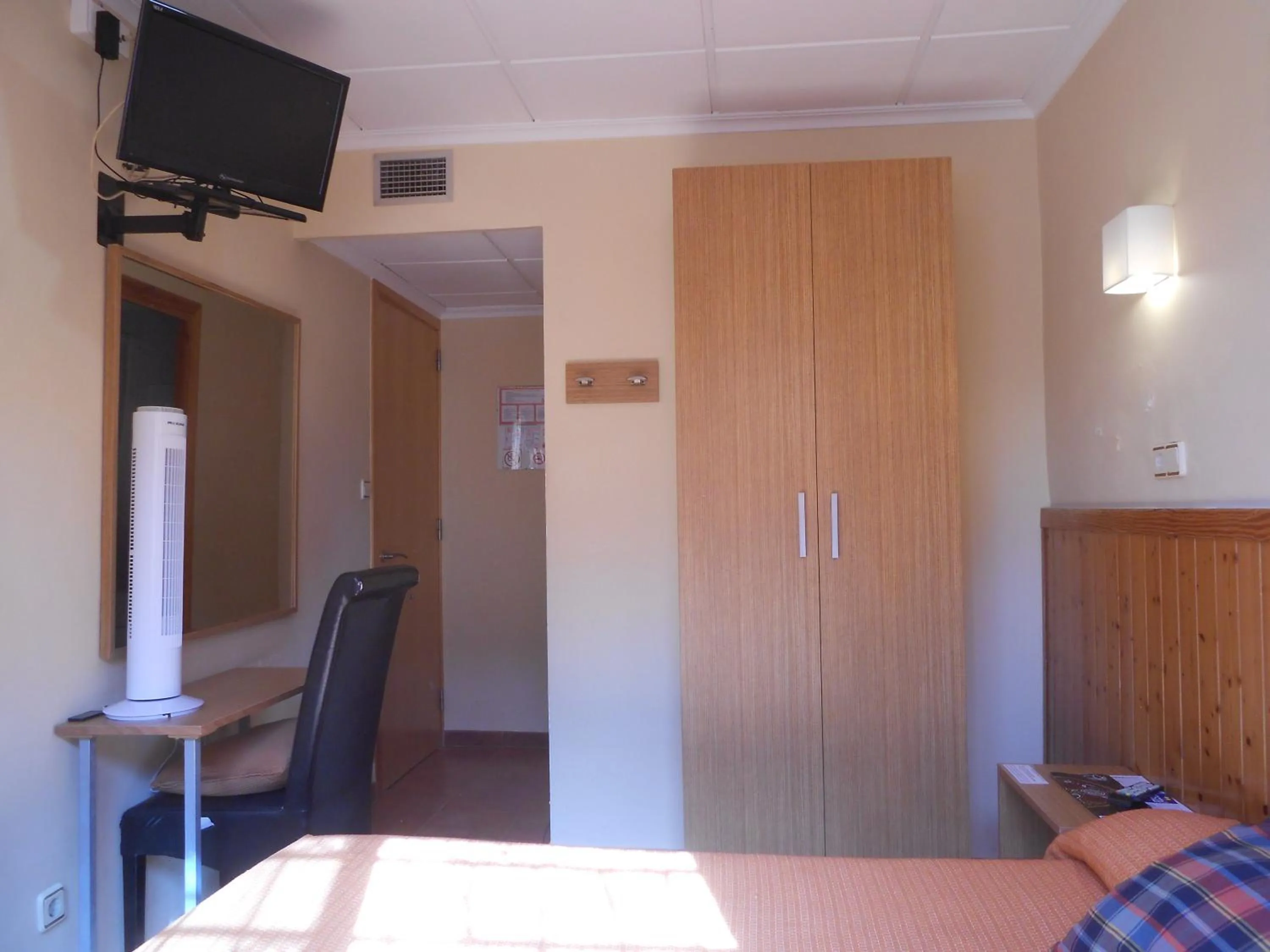 Bed in Hostal El Callejón