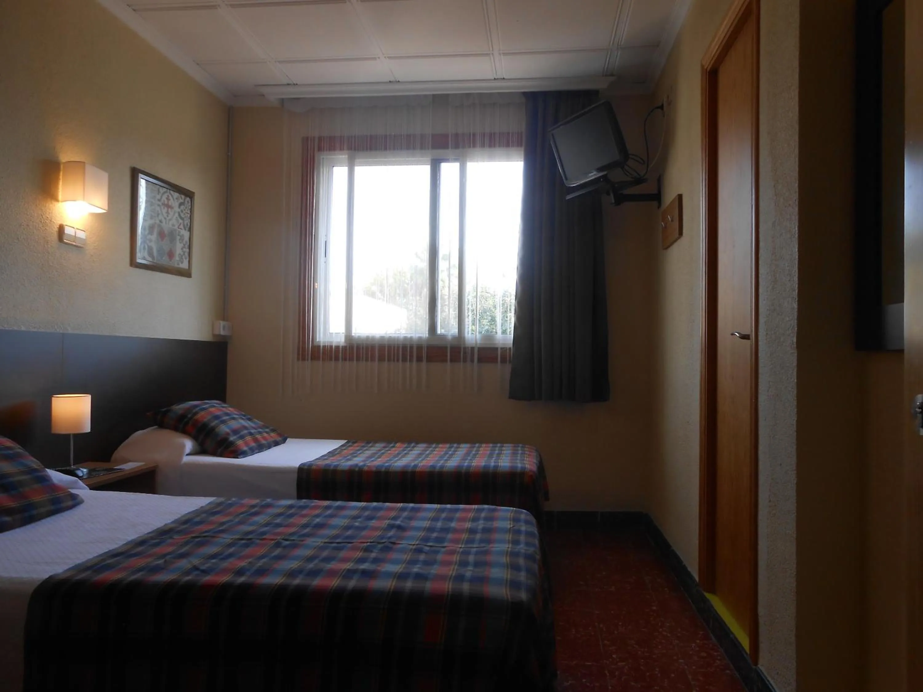 Bed in Hostal El Callejón