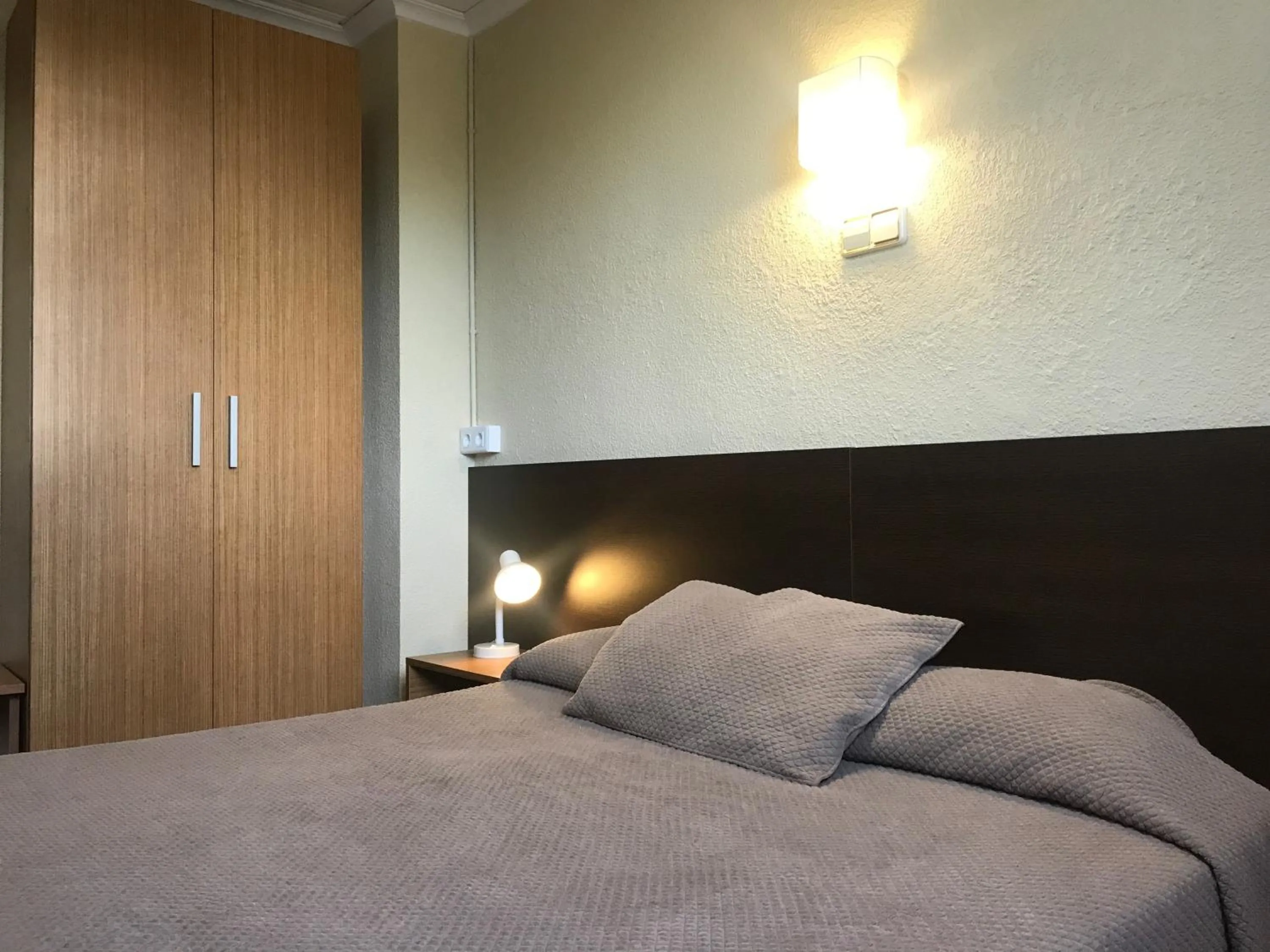 Bed in Hostal El Callejón