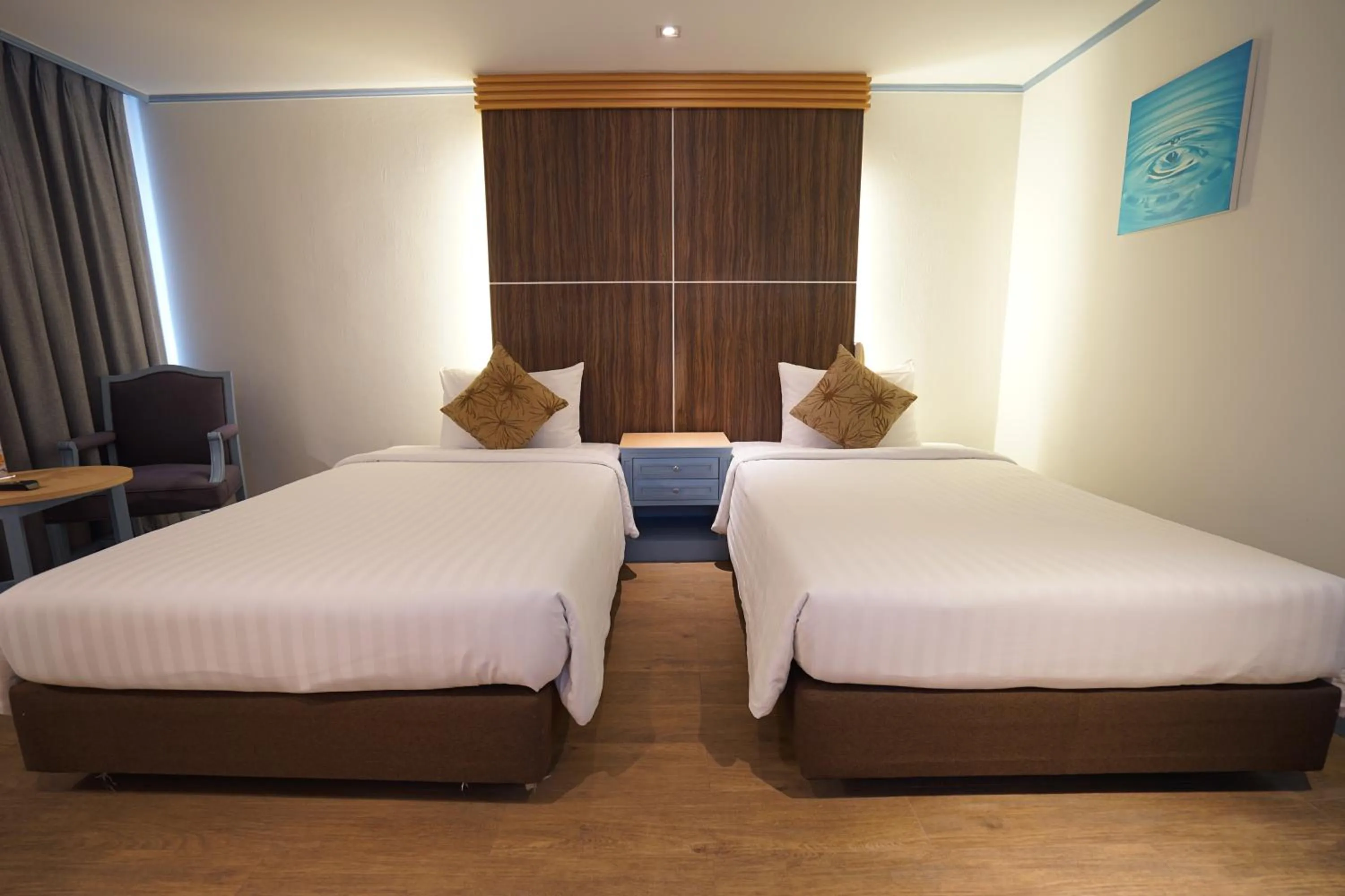 Bed in King Park Avenue Hotel Bangkok