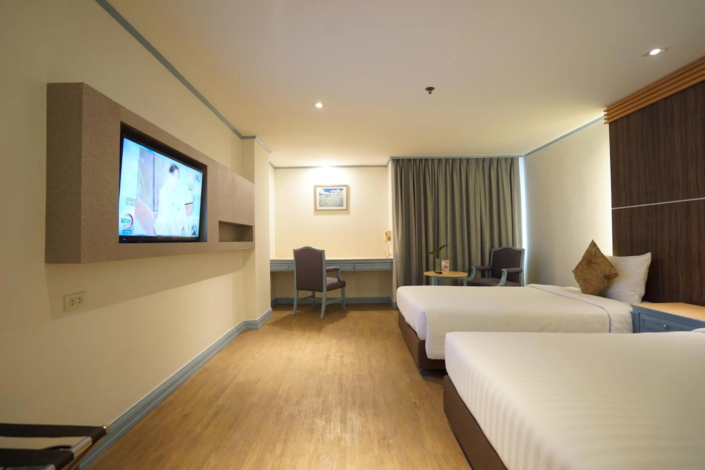 Bed in King Park Avenue Hotel Bangkok