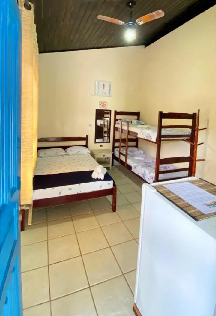 Bed in Pousada do Marcão