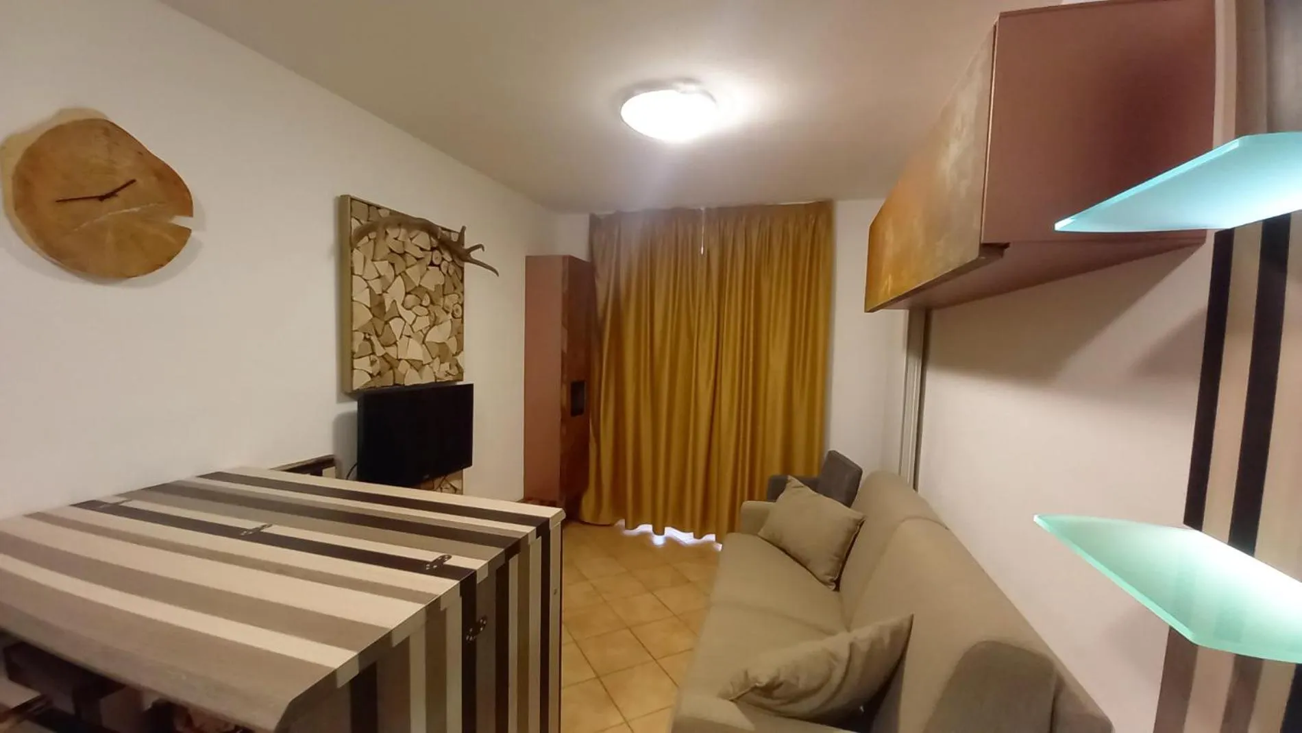 Living room, Bed in Stelviostay Residence Stelvio