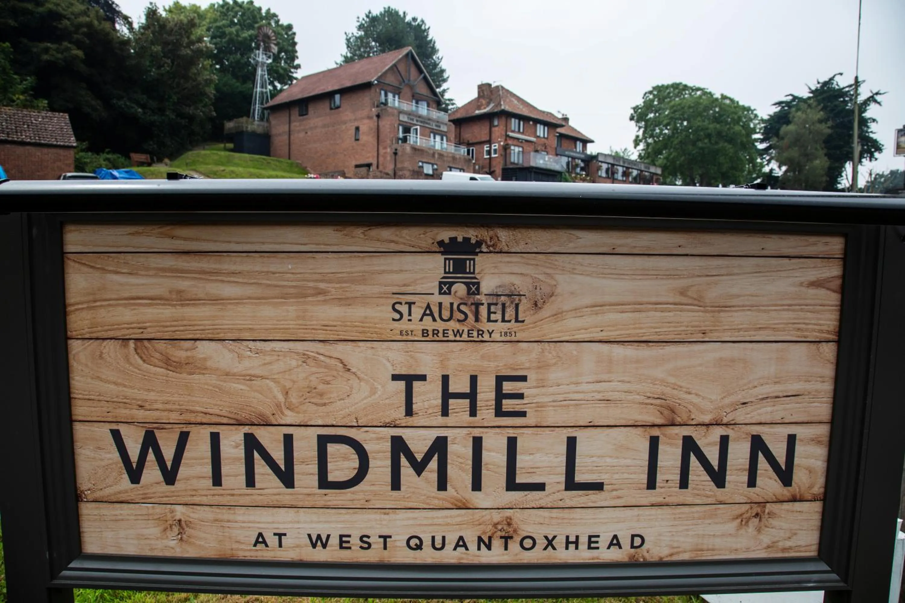 Property logo or sign in The Windmill Inn