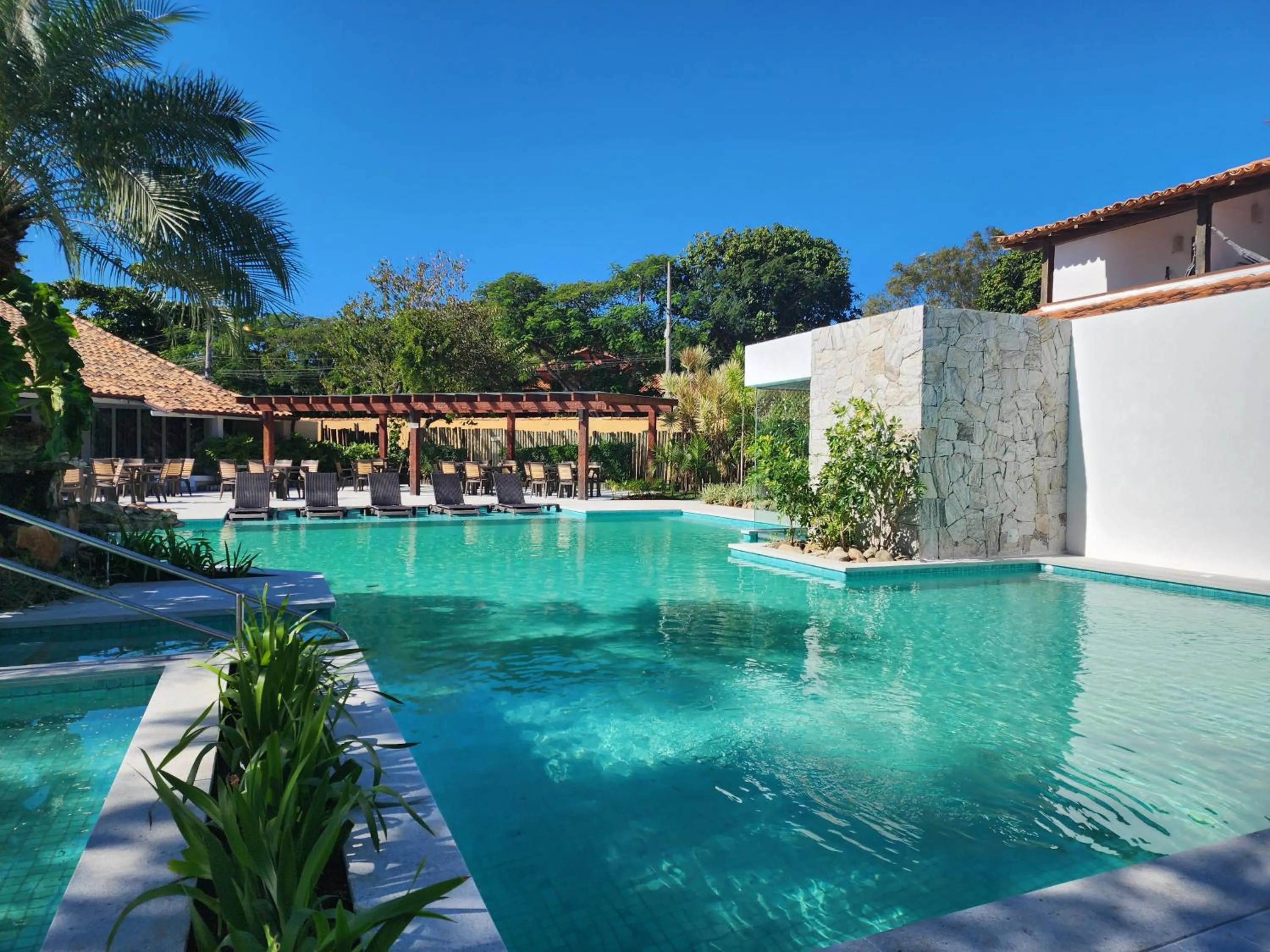 Pool view in Pousada dos Tangarás