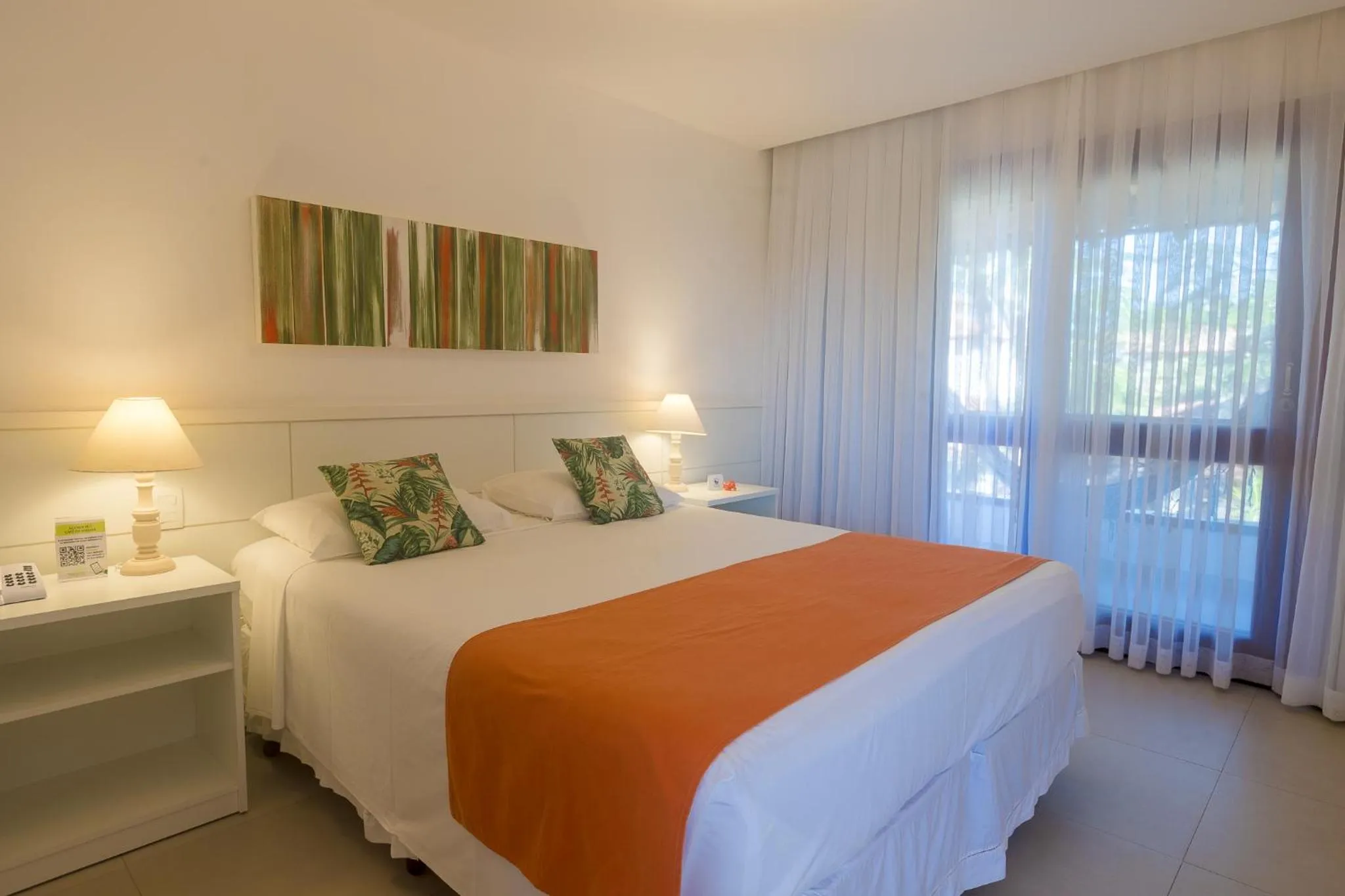 Bed in Pousada dos Tangarás