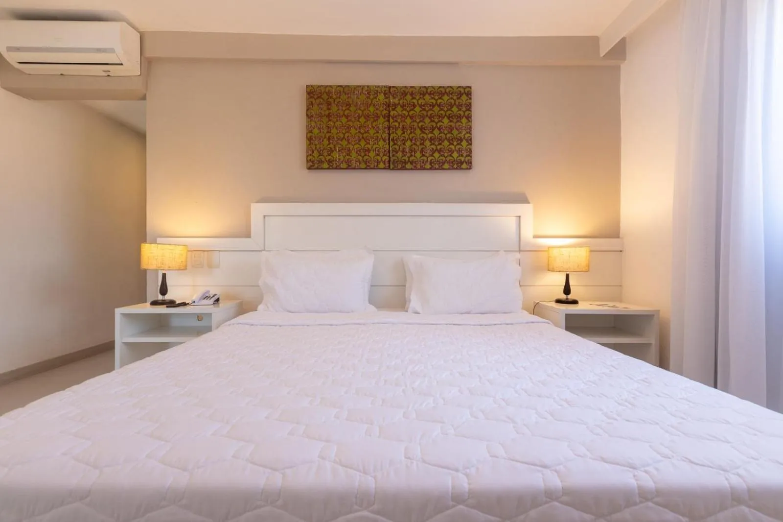 Bed in Pousada dos Tangarás