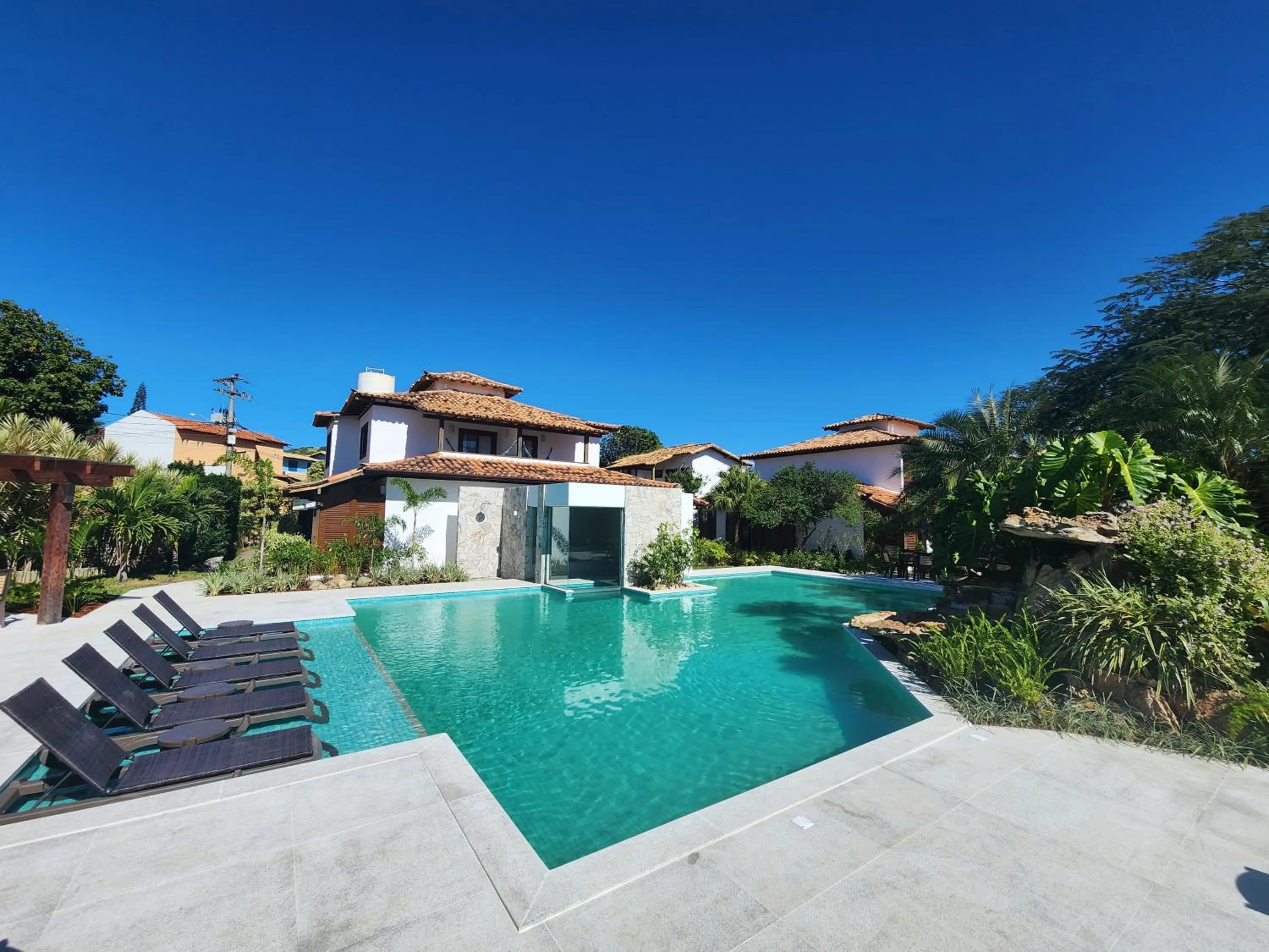 Swimming pool in Pousada dos Tangarás