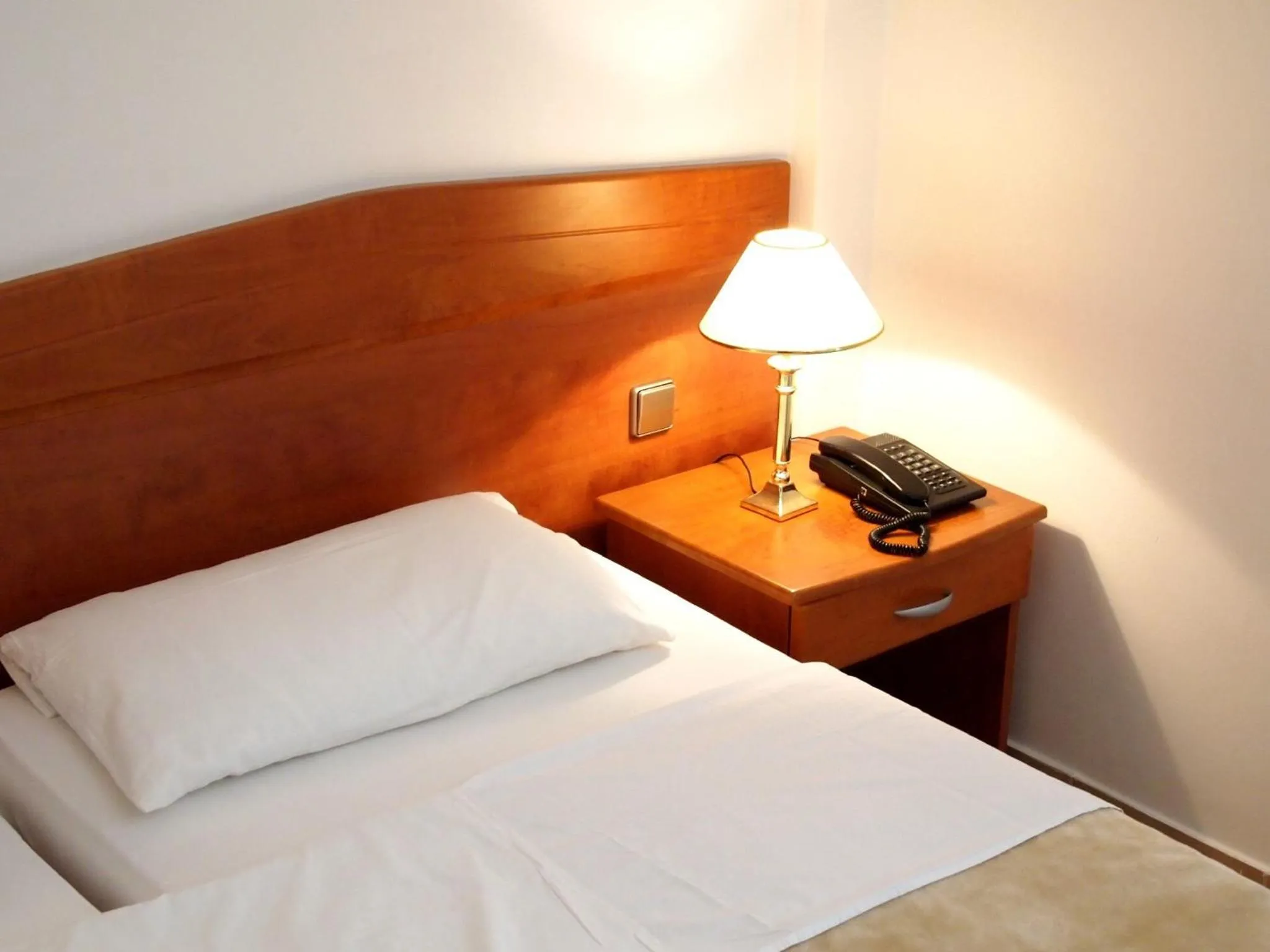 Bed in Hotel Adria