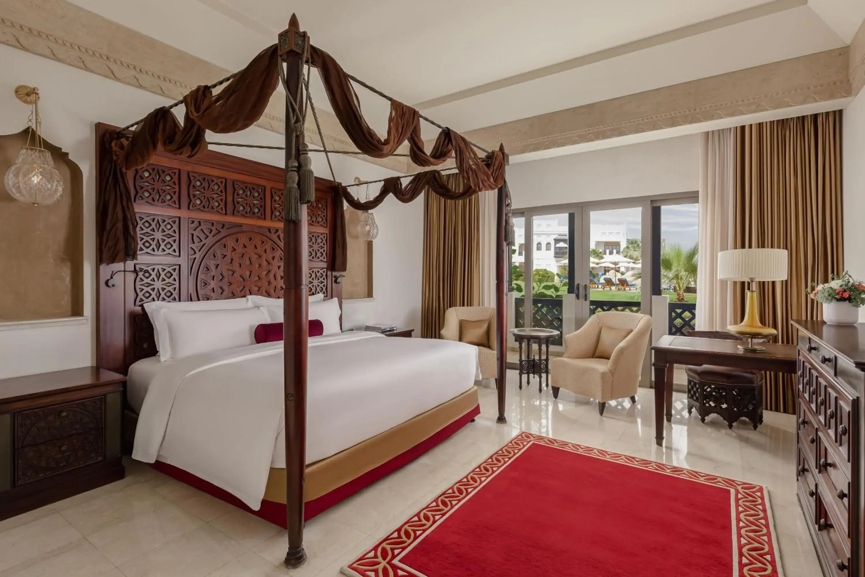 Deluxe Pool View Room, Guest room, 1 King in Sharq Village & Spa, a Ritz-Carlton Hotel Deluxe Pool View Room, Guest room, 1 King in Sharq Village & Spa, a Ritz-Carlton Hotel
