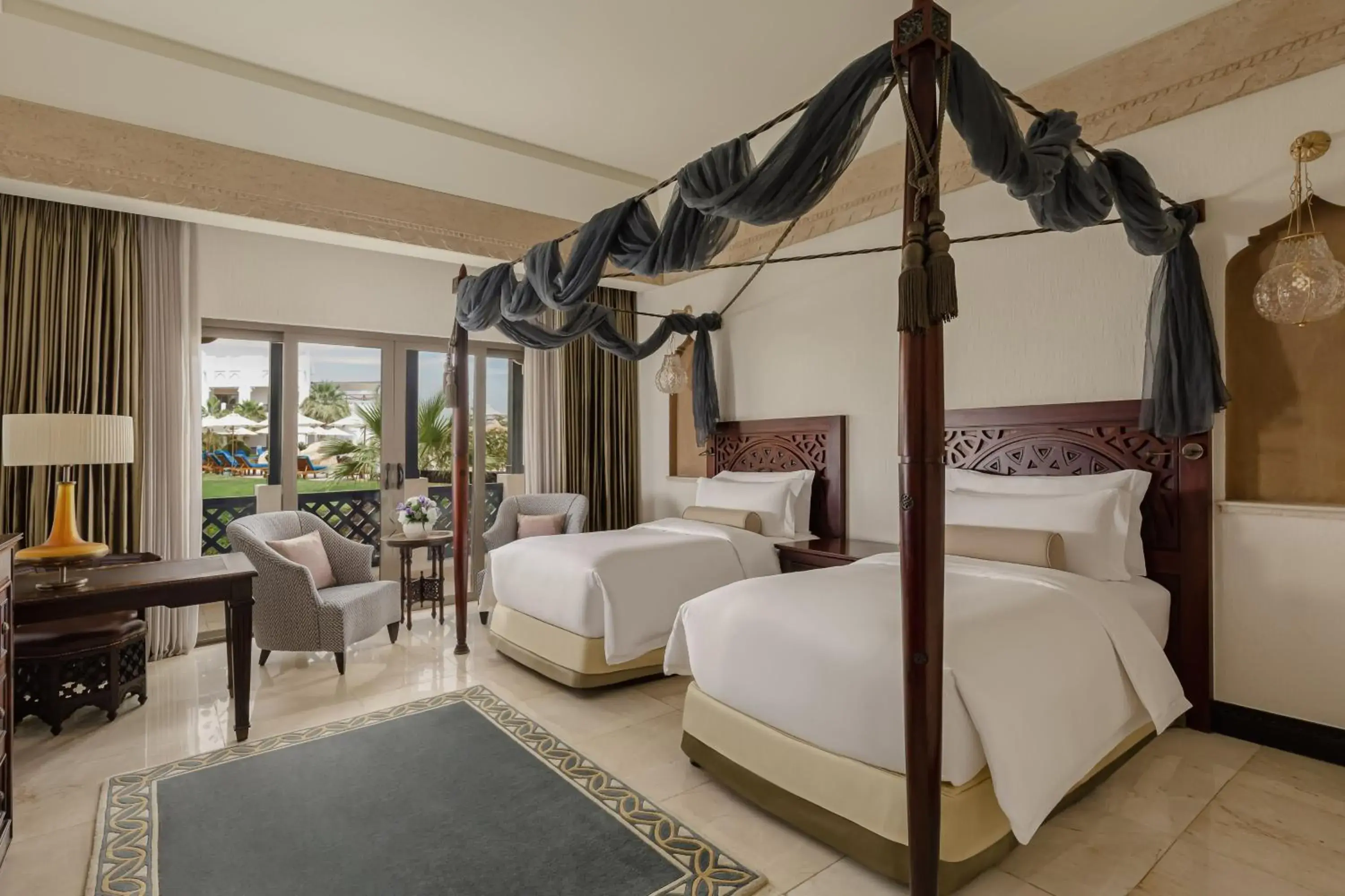 Deluxe Pool View Room, Guest room, 2 Twin/Single Bed(s) in Sharq Village & Spa, a Ritz-Carlton Hotel Deluxe Pool View Room, Guest room, 2 Twin/Single Bed(s) in Sharq Village & Spa, a Ritz-Carlton Hotel