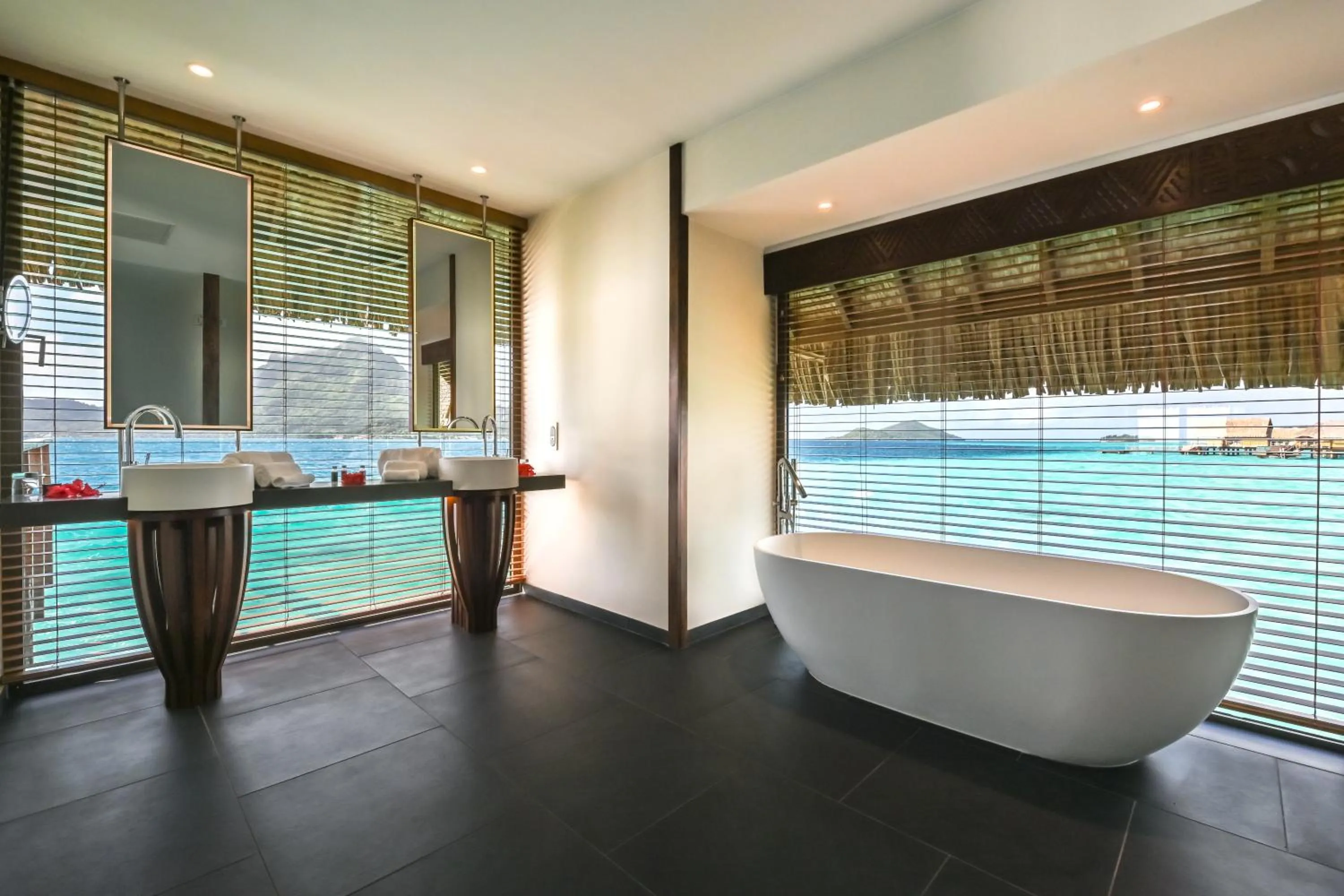 Bathroom in Le Bora Bora by Pearl Resorts