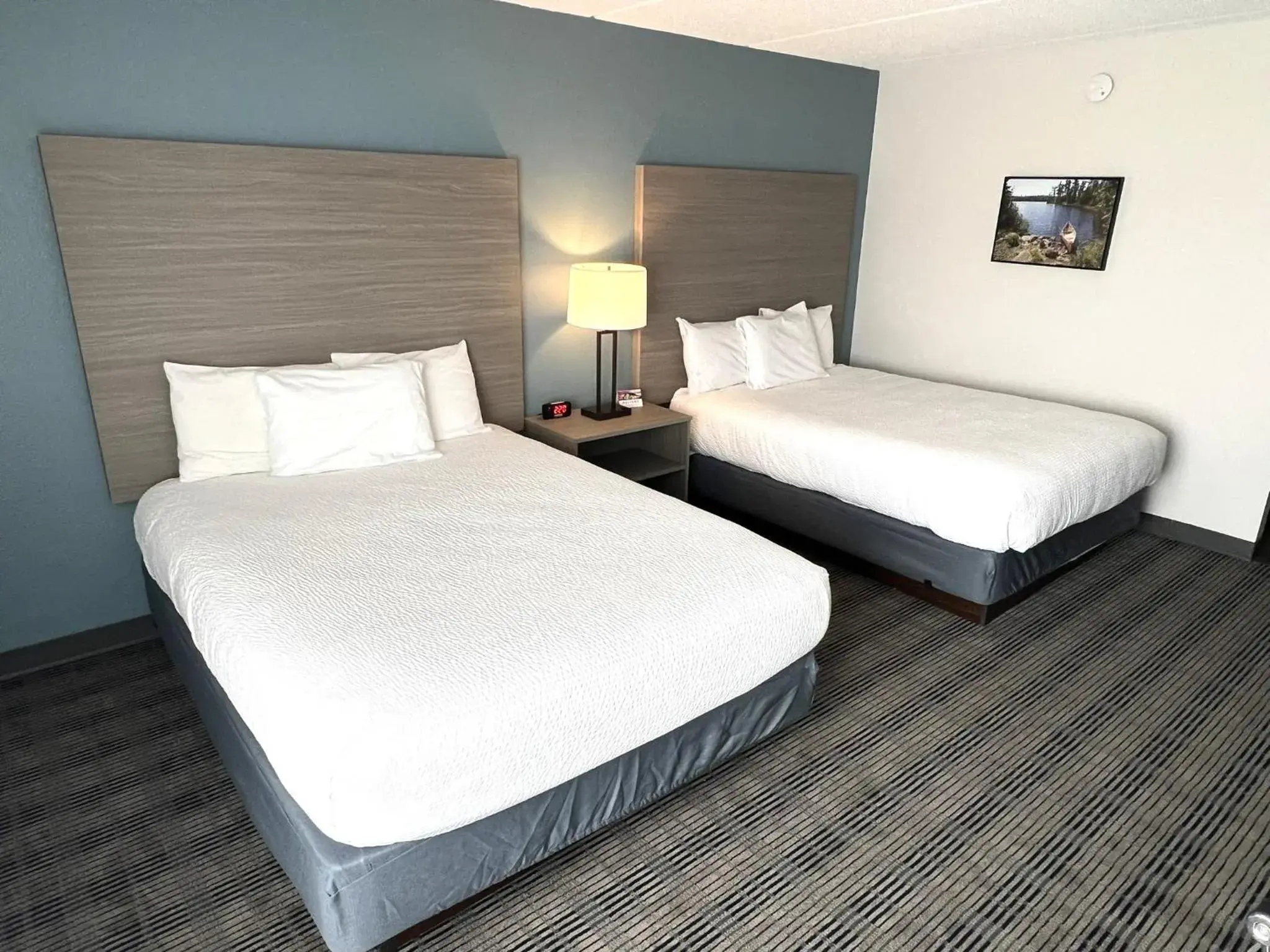 Bedroom, Bed in AmericInn by Wyndham Baxter Brainerd Bedroom, Bed in AmericInn by Wyndham Baxter Brainerd