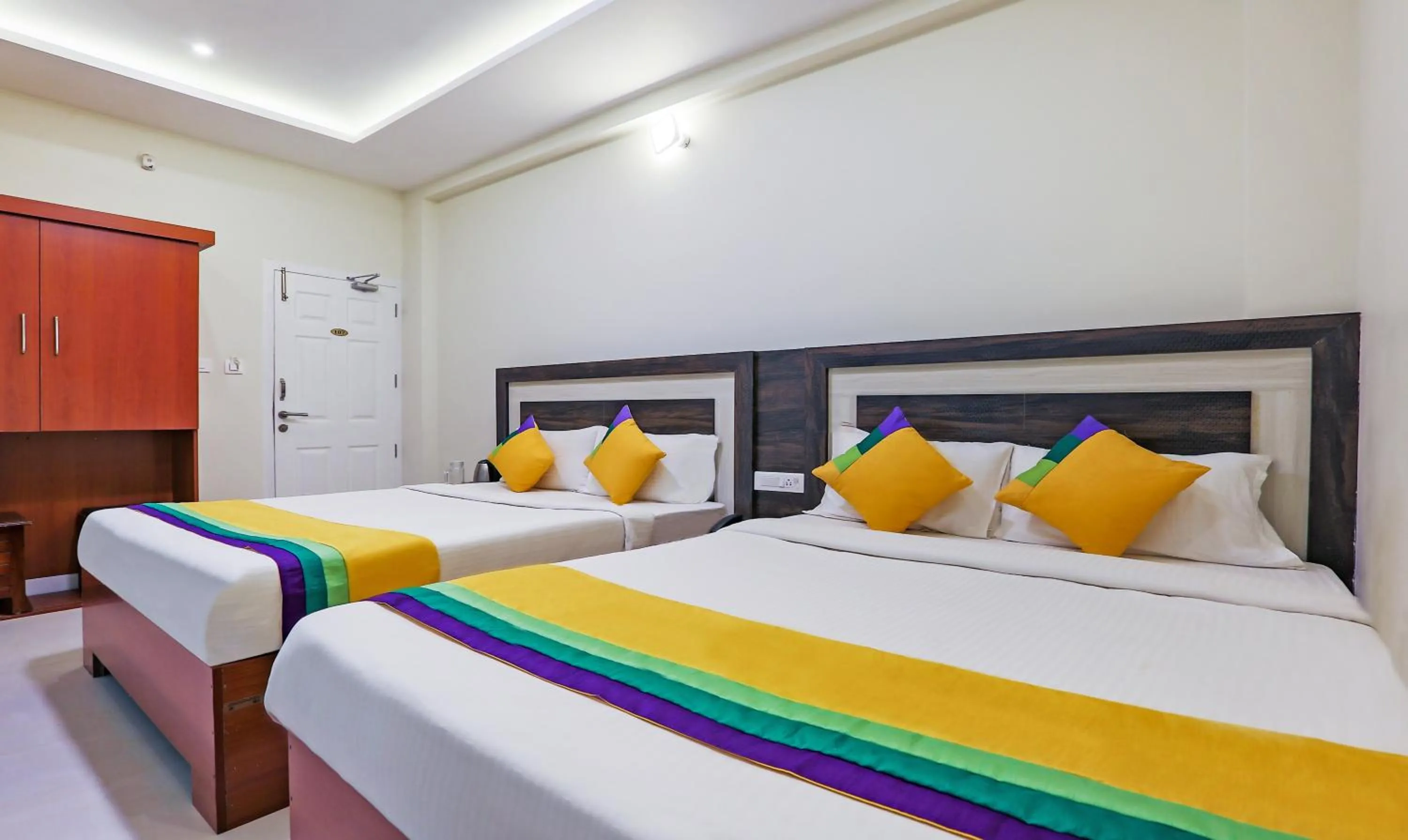 Bedroom, Bed in Itsy Hotels Kottaram Residency, 10 Mins To Botanical Garden