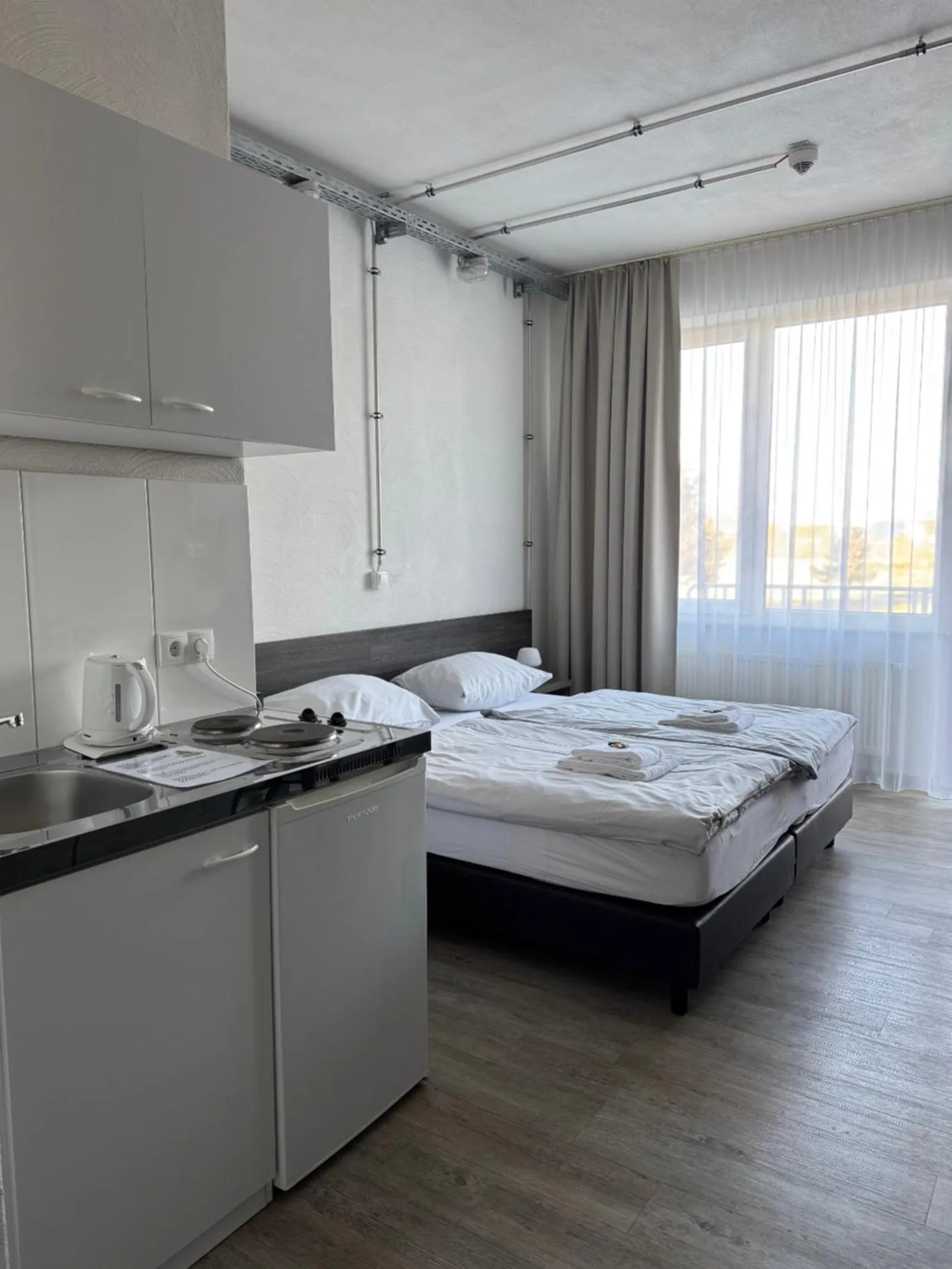 Photo of the whole room, Bed in Gästehaus Haßloch/Pfalz