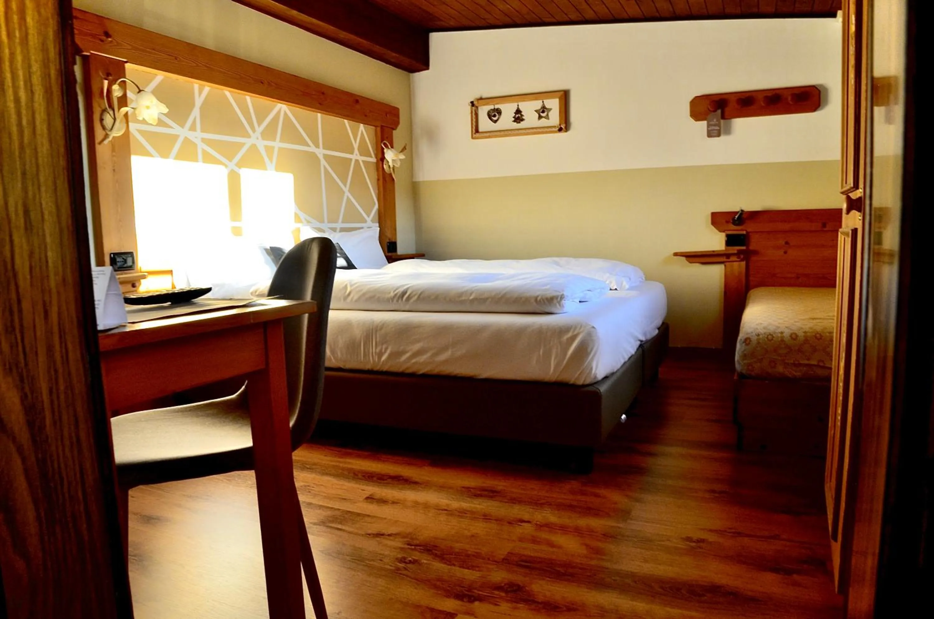 Decorative detail, Bed in Hotel Garni Edy