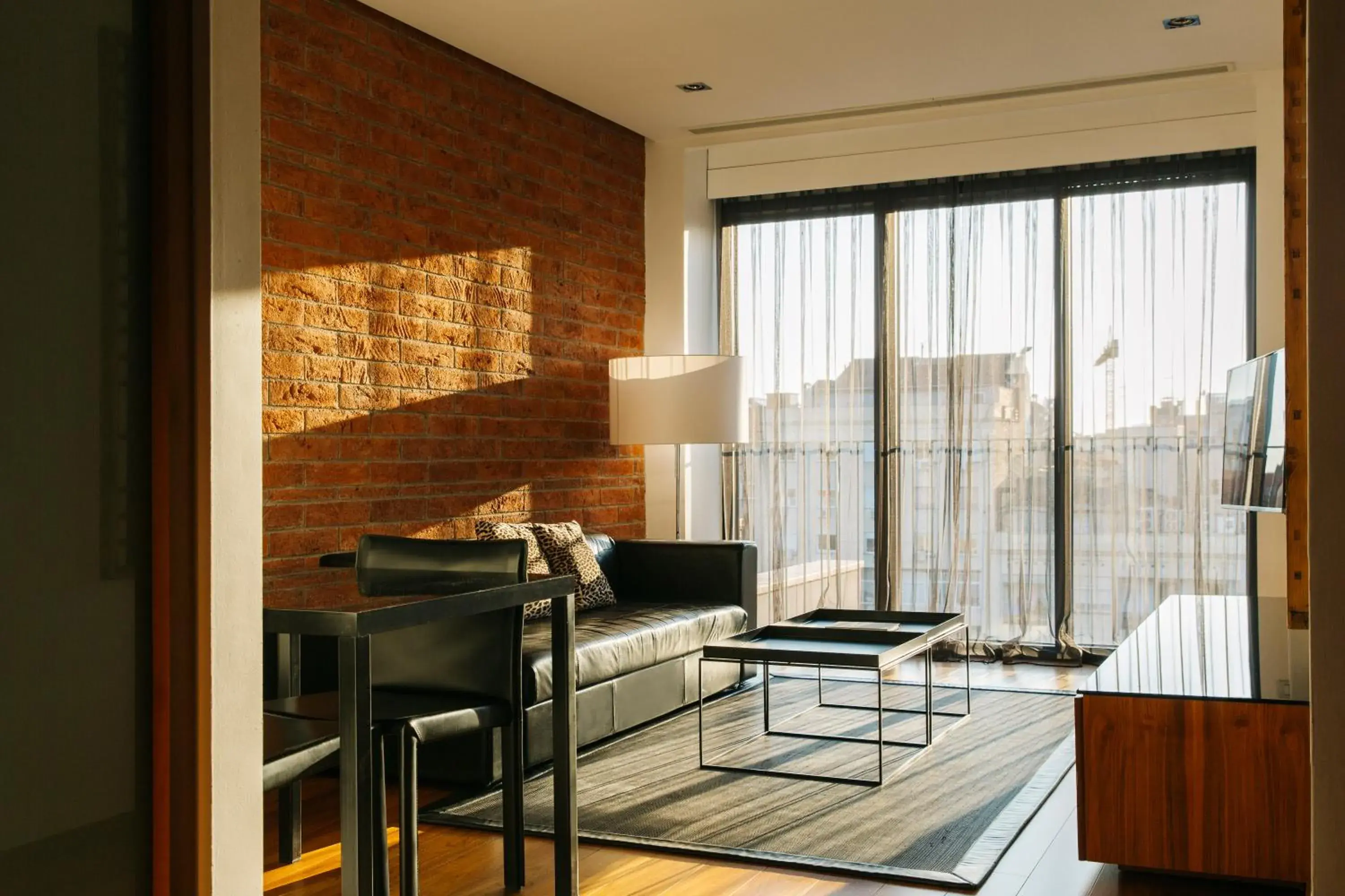 Living room in Suites Avenue Living room in Suites Avenue