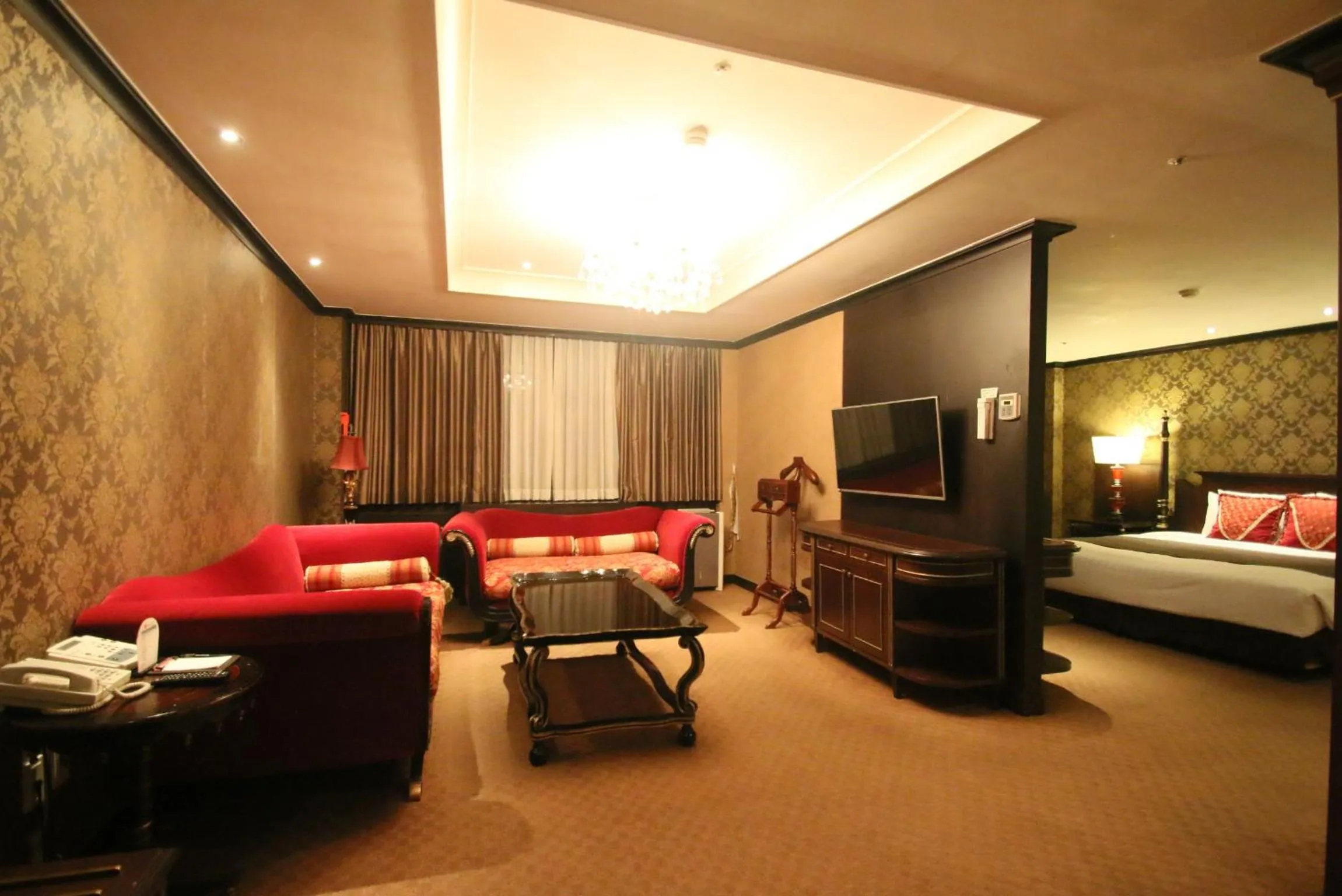 Living room, Bed in Ramada by Wyndham Songdo