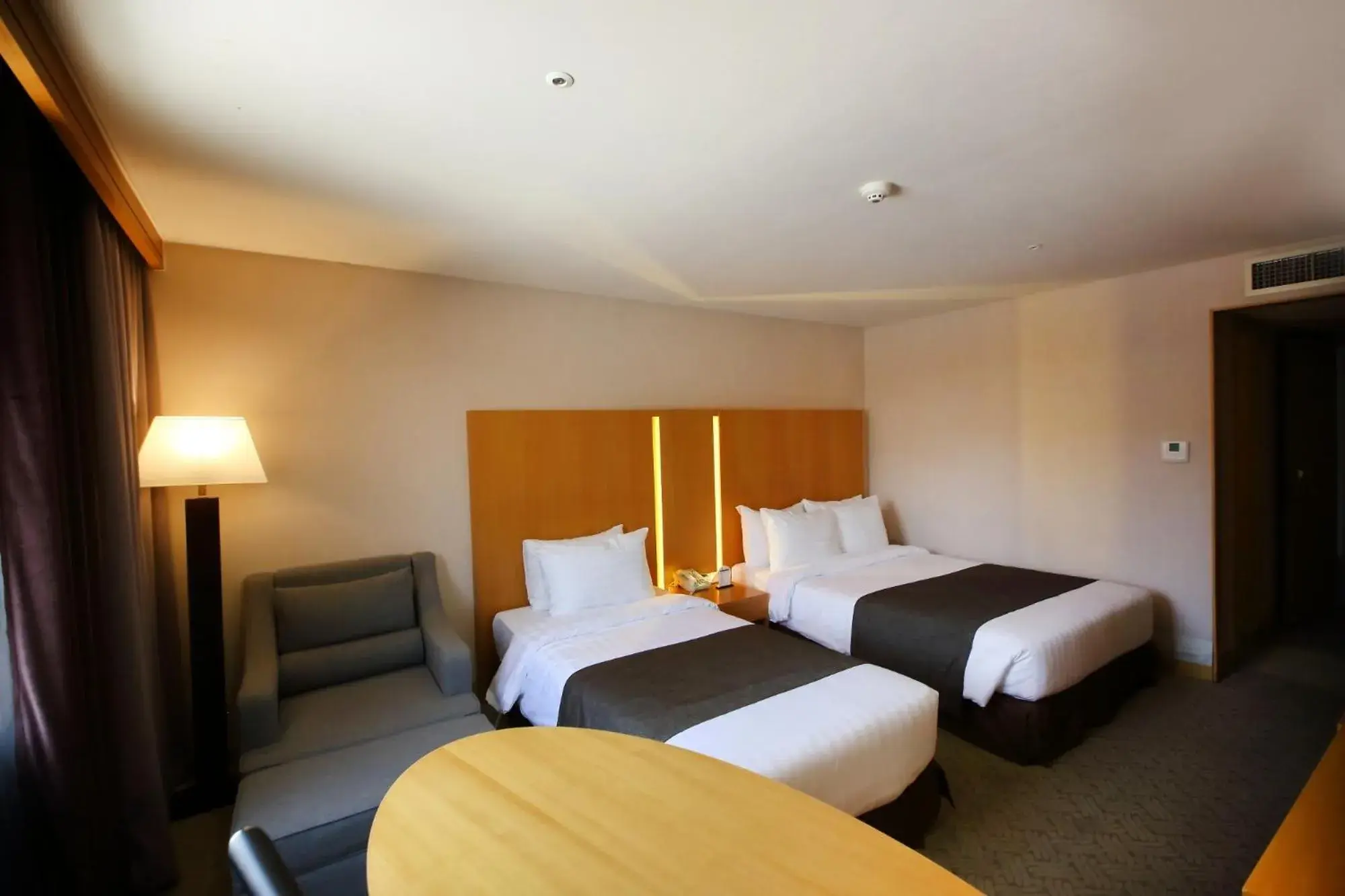 Bed in Ramada by Wyndham Songdo Bed in Ramada by Wyndham Songdo