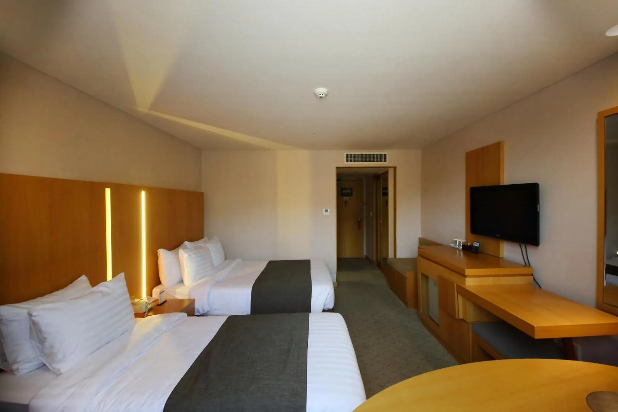 Bed in Ramada by Wyndham Songdo